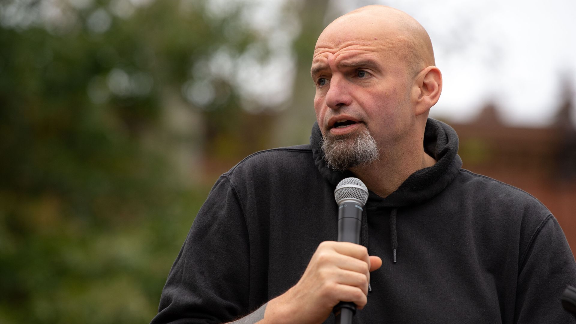 Pennsylvania's Lieutenant Governor John Fetterman speaks to supporters gathered in Dickinson Square Park in Philadelphia on October 23.