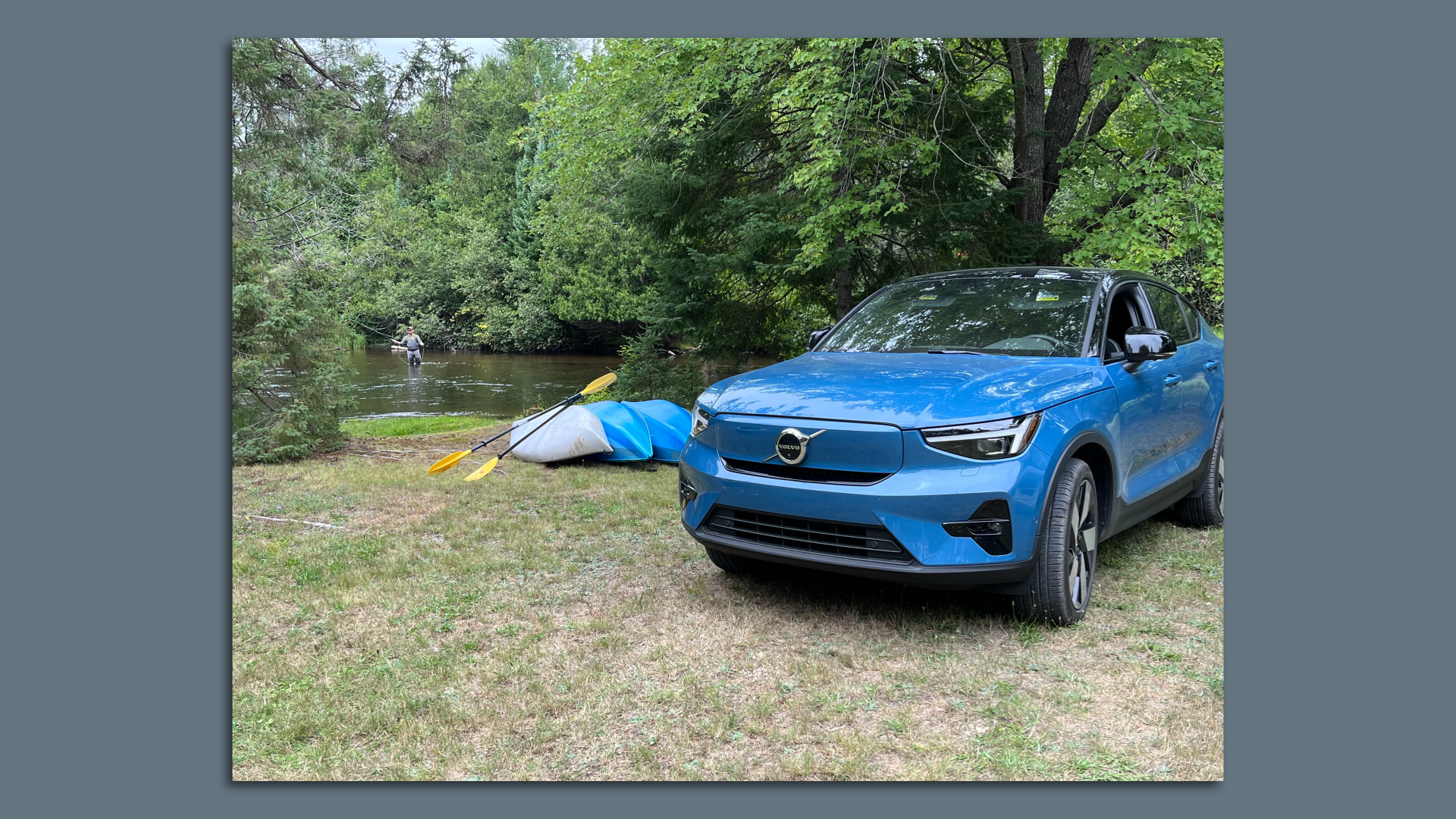 Volvo C40 Recharge parked alongside the Au Sable river in Michigan, known as the "Holy Waters" for fly-fishing