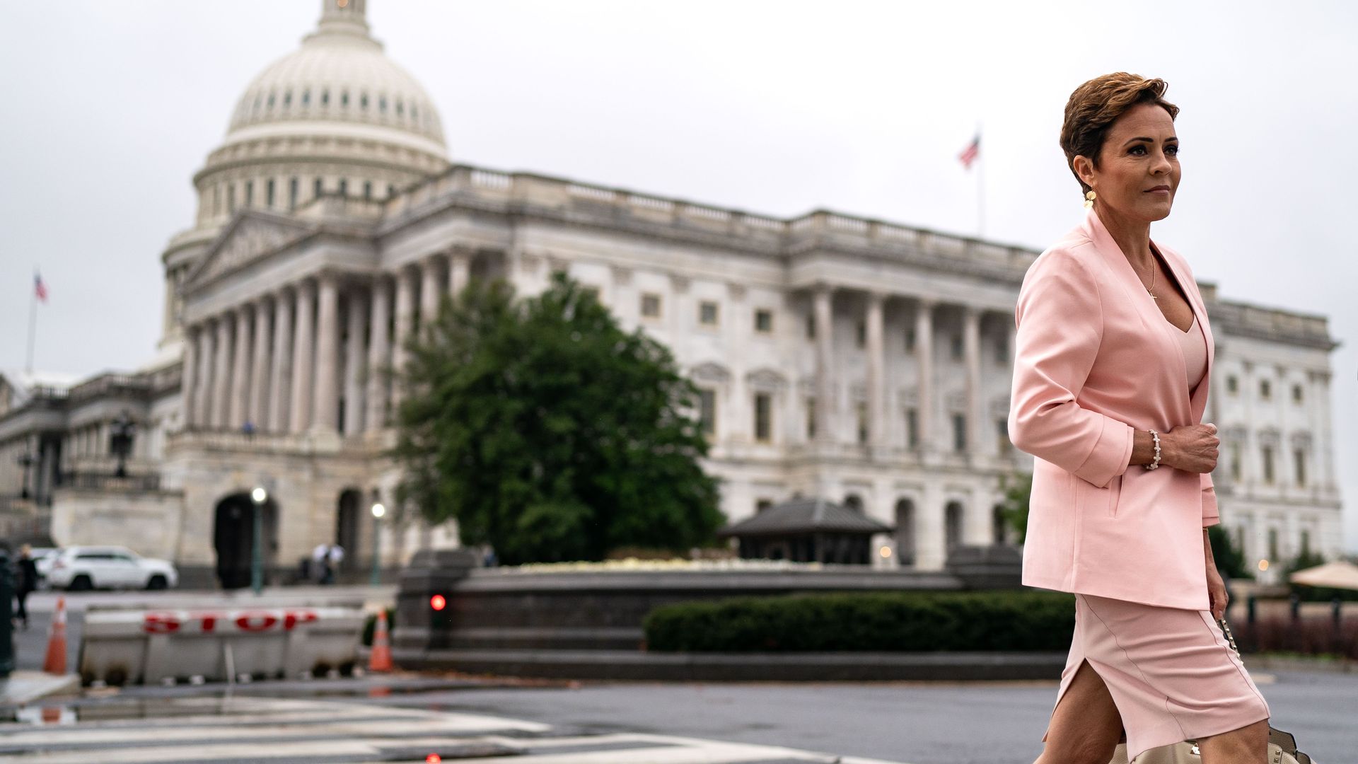 Arizona Republican Senate Candidate Kari Lake and an aide depart Capitol Hill on March, 6 2024 in Washington, DC.