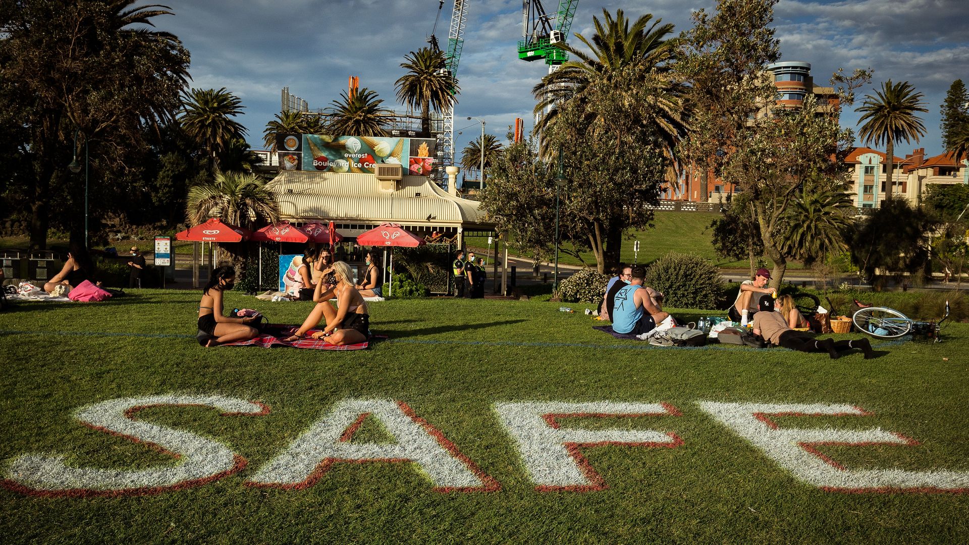  People enjoy the sun at St Kilda beach while social distancing on October 03, 2020 in Melbourne, Australia. 