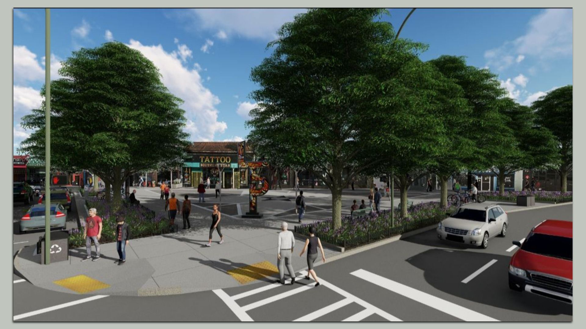 Urban street scene with pedestrians crossing, parked cars, and large green trees lining the sidewalk near a tattoo shop under blue sky with scattered clouds.
