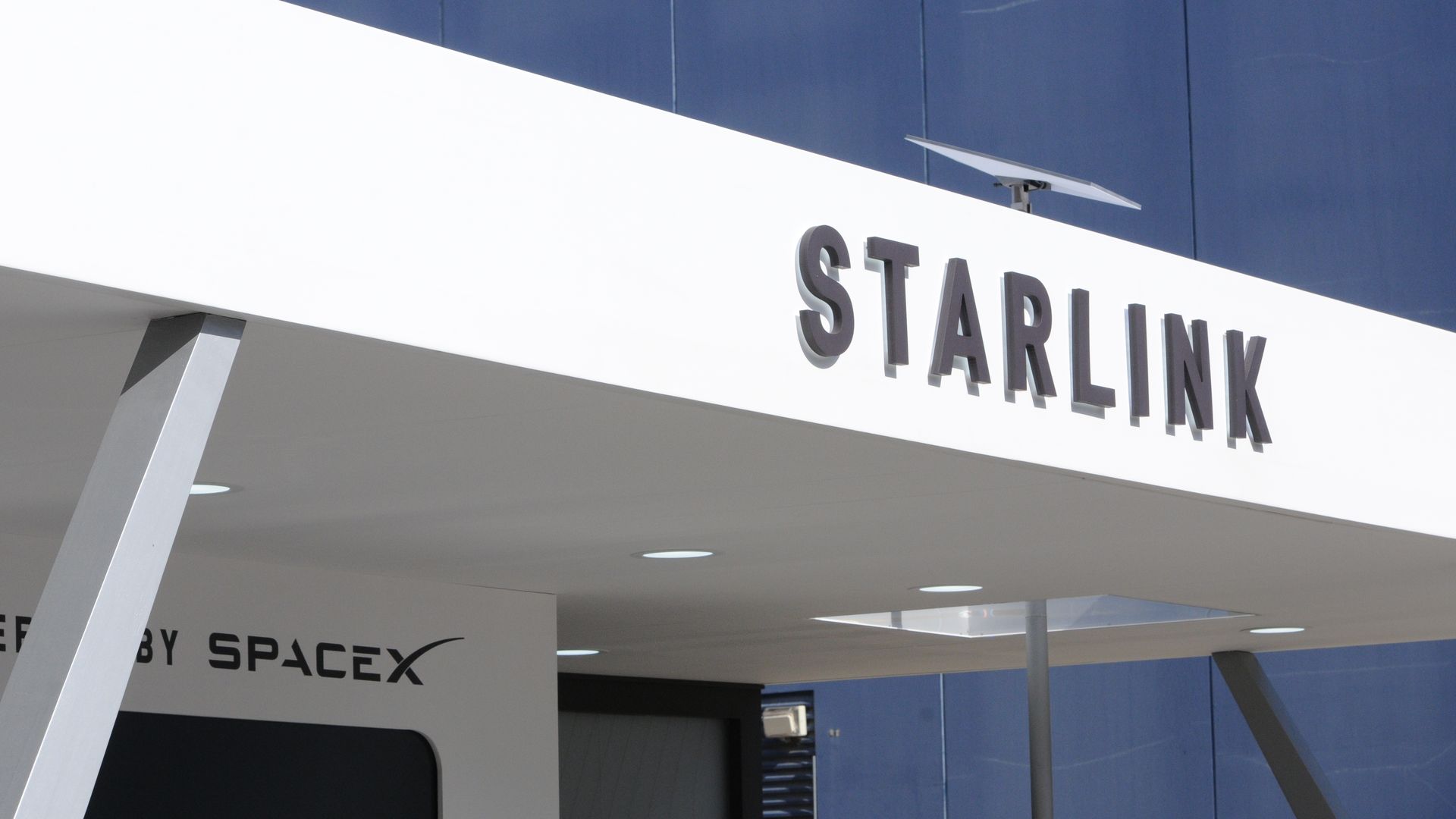 An image of the building with STARLINK written outside of it and the SpaceX logo