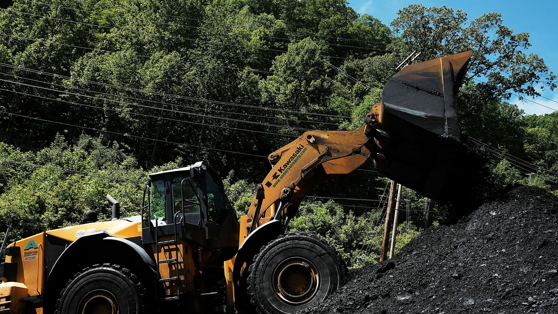 A tractor at a coal plant