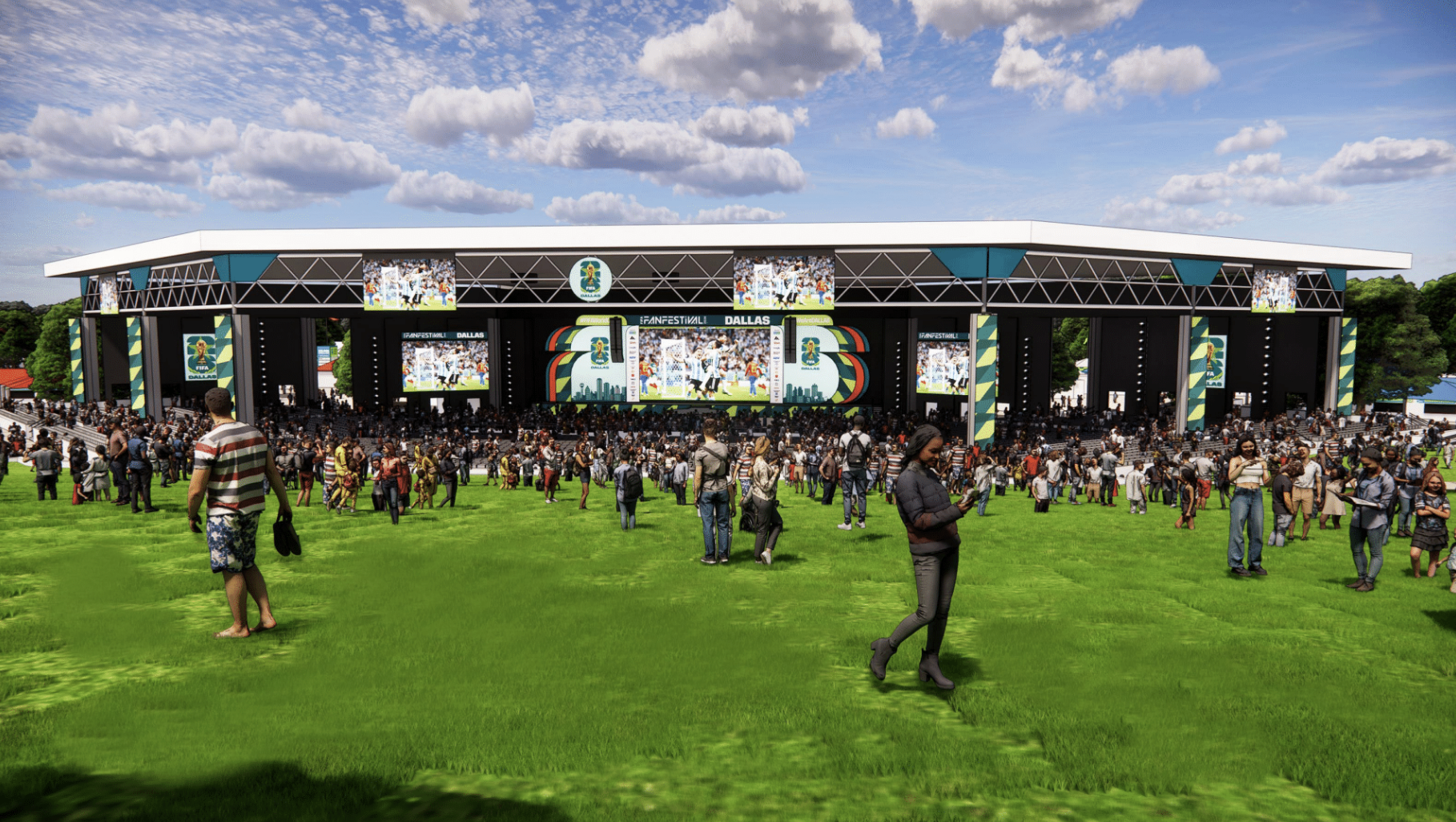 Outdoor festival scene: a large, modern stage with teal accents and multiple video screens, a dense crowd on bright green grass, under a blue sky with scattered white clouds.