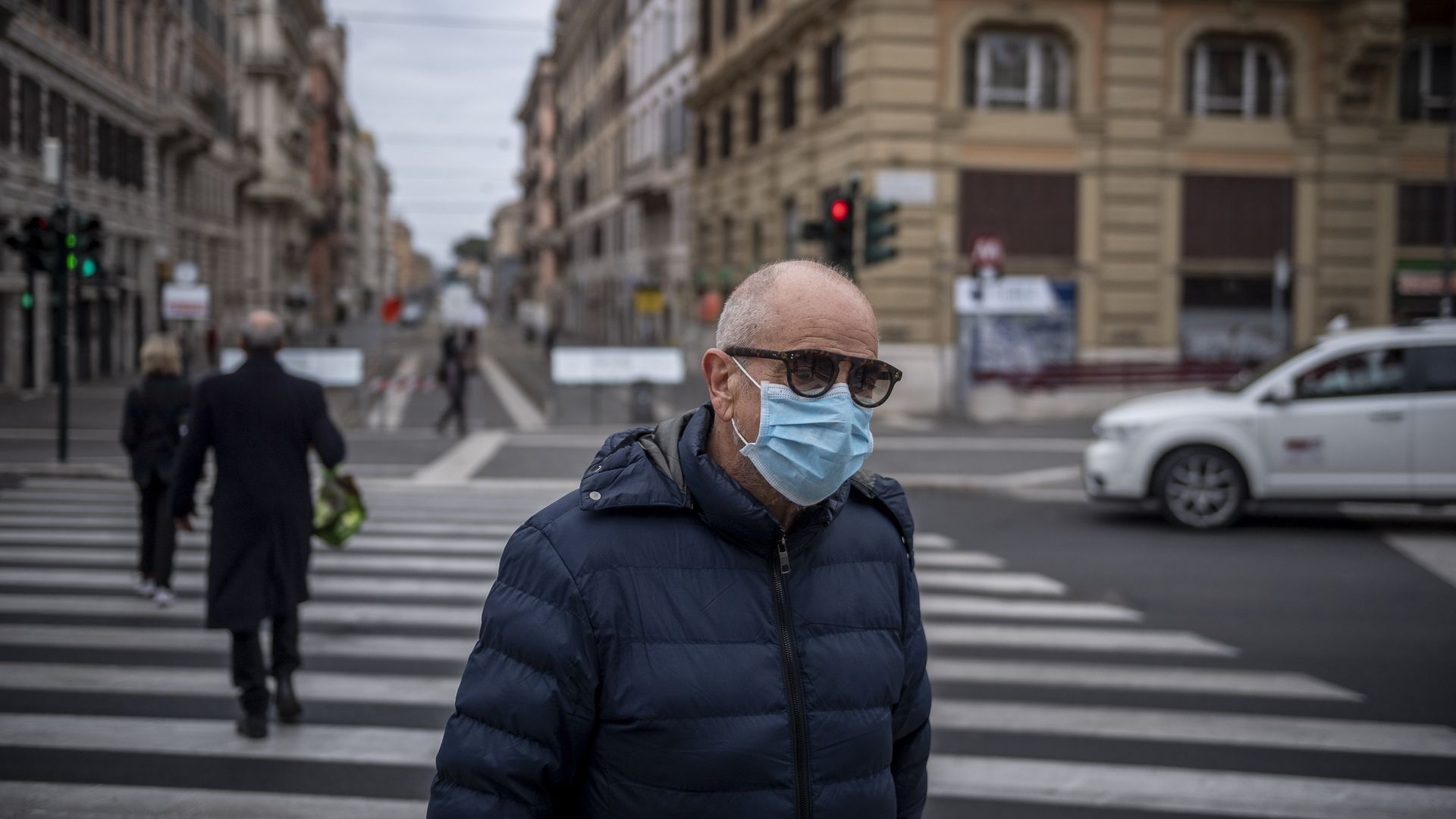 People wearing masks in Rome on March 14