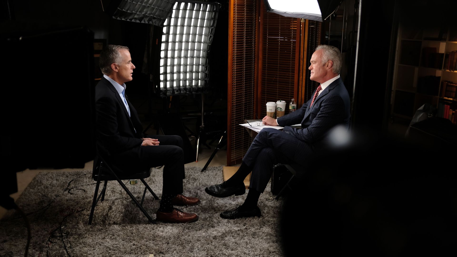 In this image, Andrew McCabe talks to Scott Pelley on "60 Minutes." Both men sit across from each other in a carpeted interview studio.