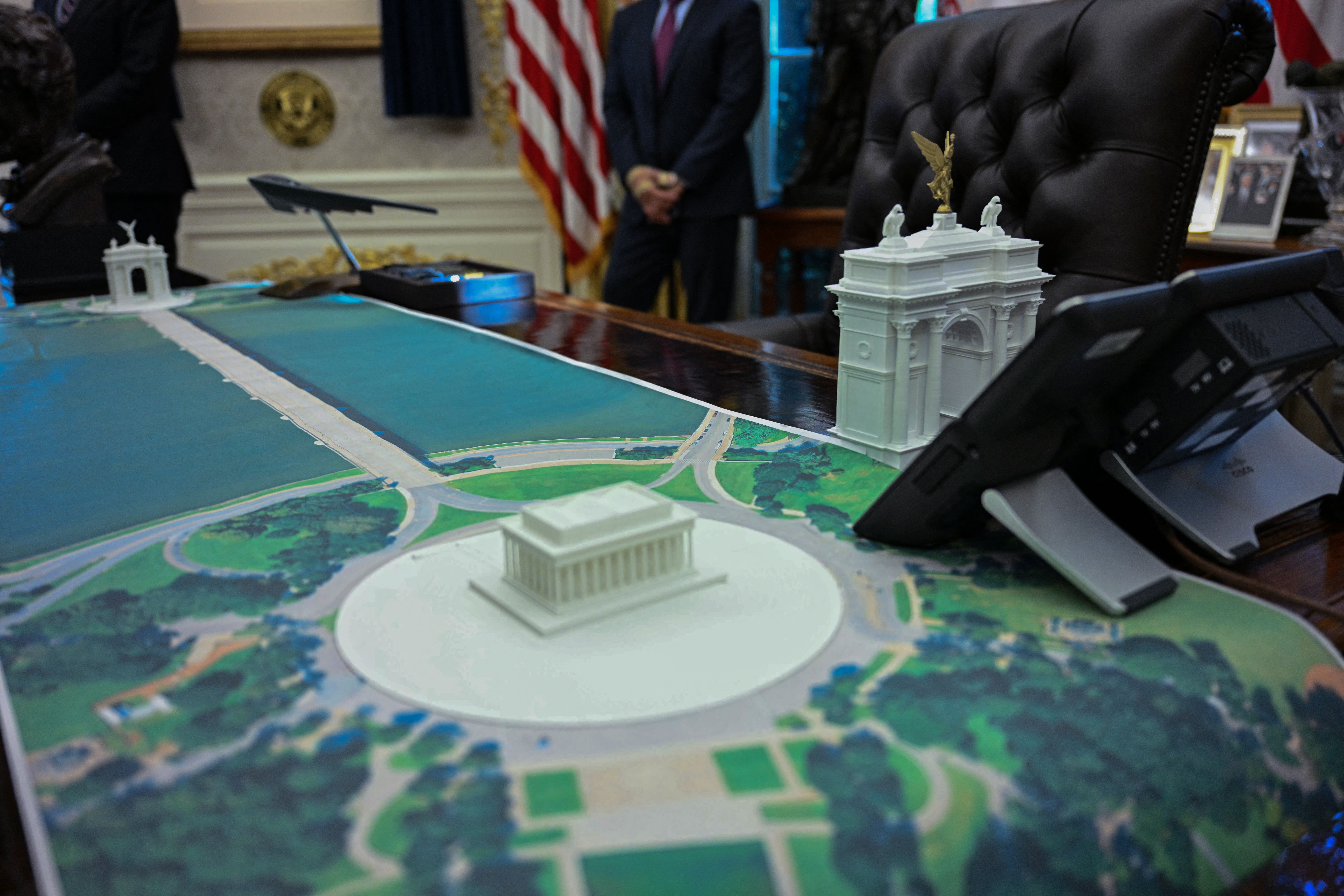 A model of an arch is seen on the Resolute Desk during President Trump's Oval Office meeting yesterday with Finnish President Alexander Stubb. Photo: Jim Watson/AFP via Getty Images