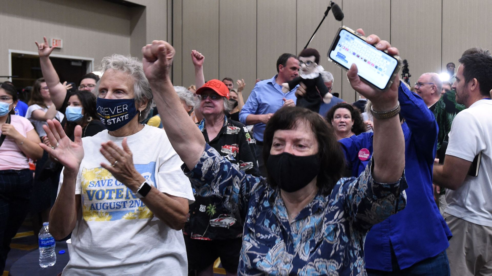 Abortion rights supporters cheer as the proposed Kansas Constitutional amendment fails as they watch the call from the networks during the vote earlier this month.