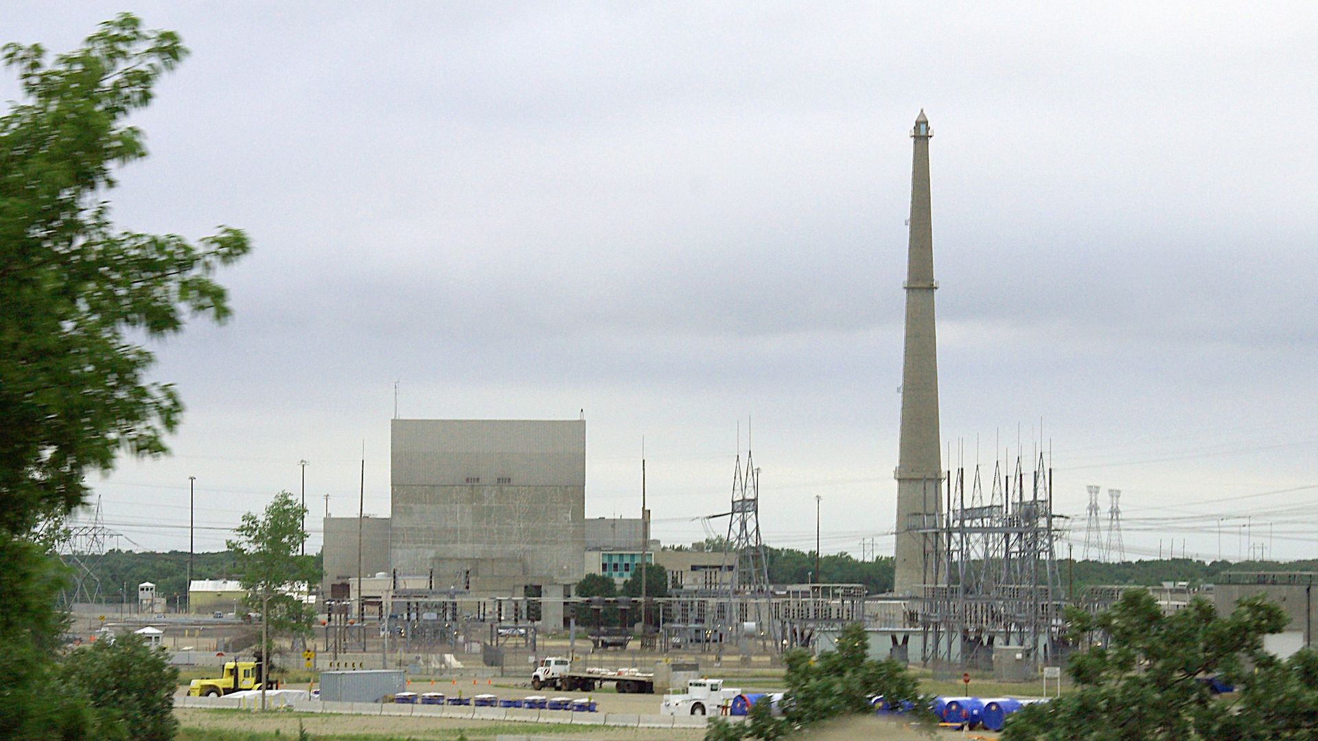 A grayish brown building and large column of a nuclear power plant in Minnesota
