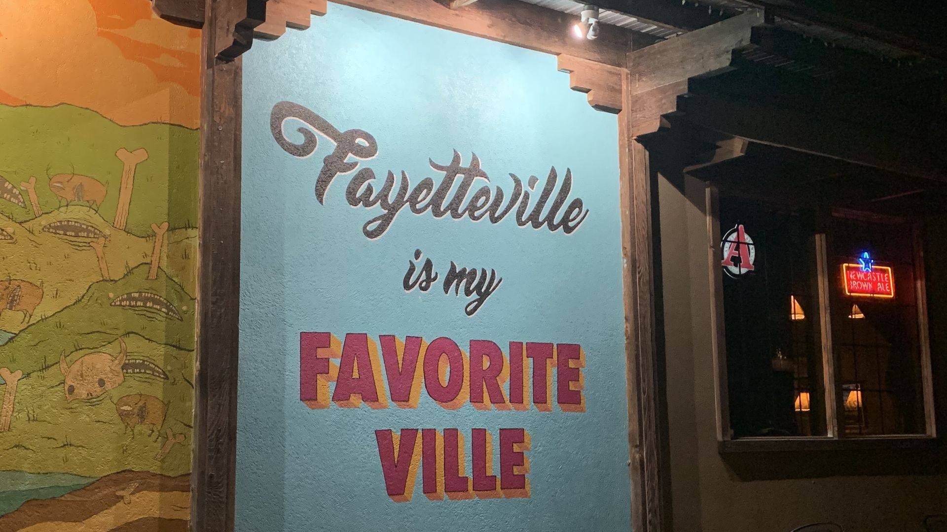 A sign that reads Fayetteville is my favorite ville