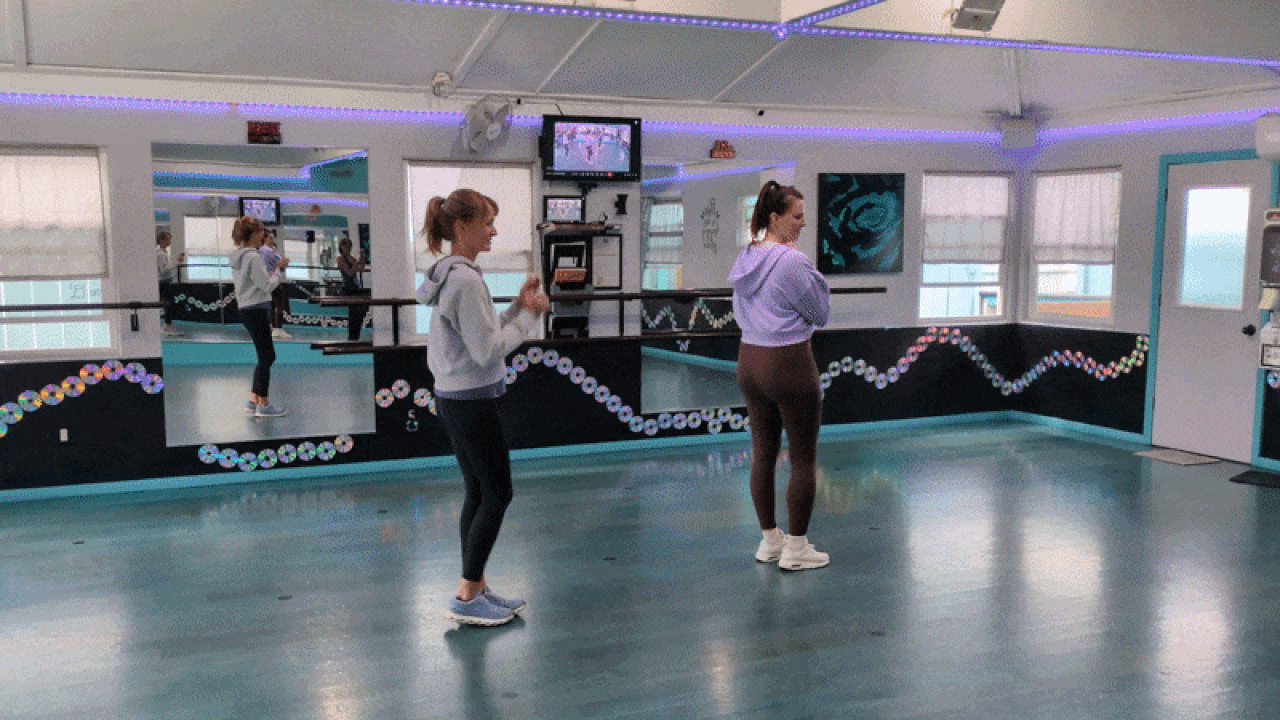 Claire and Kate practice their dance moves.