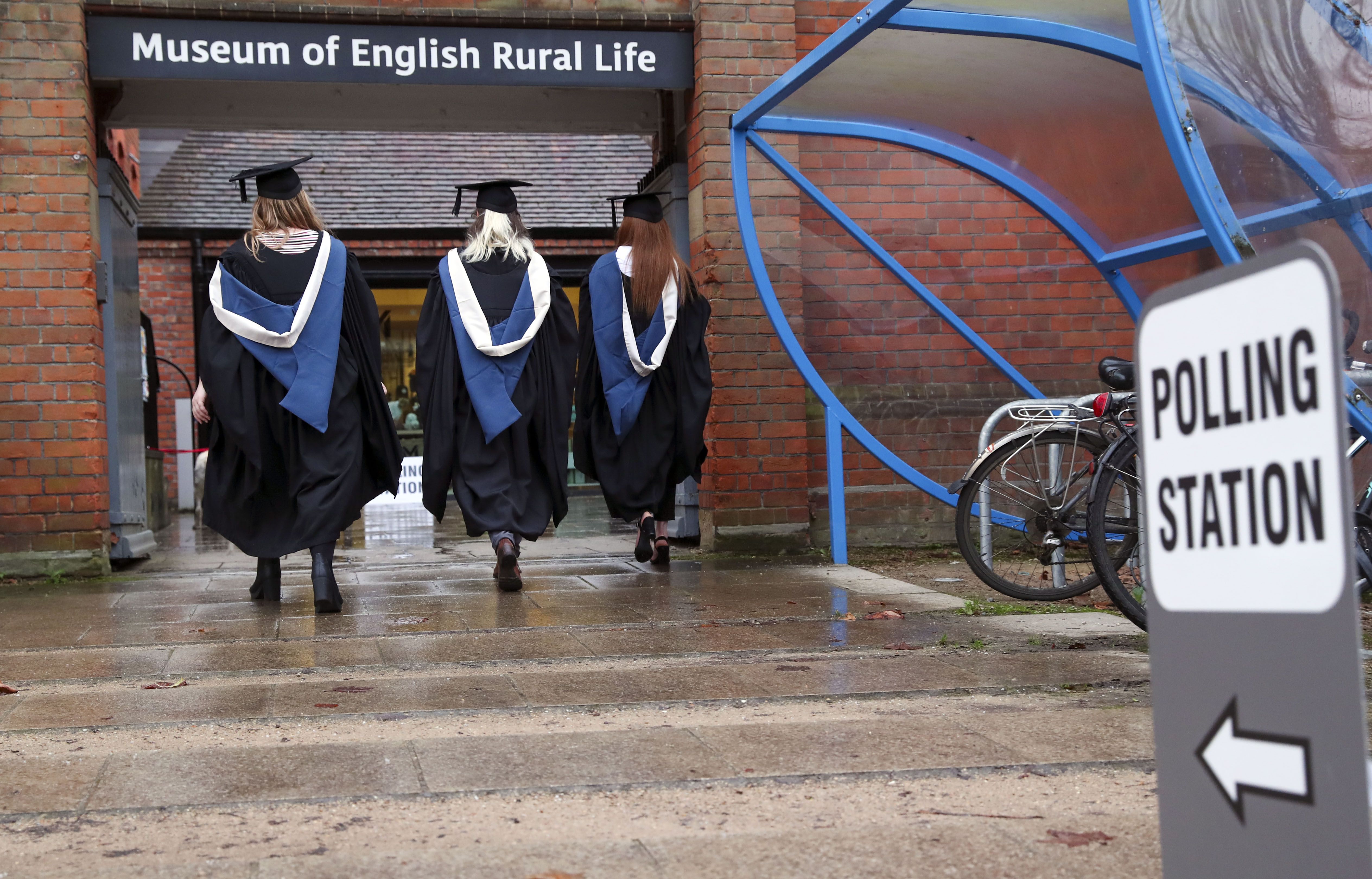 Students from the University of Reading arrive to vote in the General Election 2019 on graduation day