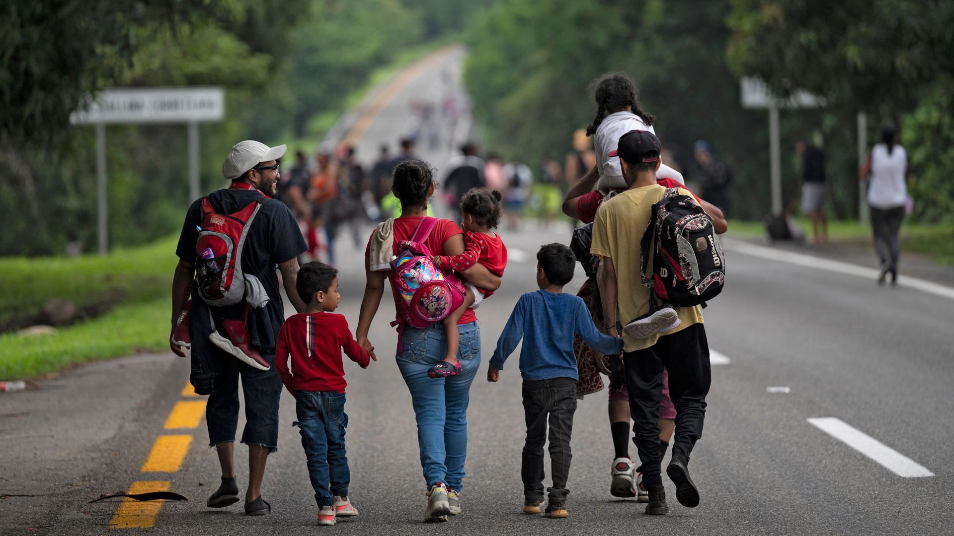 Migrants taking part in a caravan heading to the US, walk from Huixtla to Escuintla, Chiapas state, Mexico, on June 9.