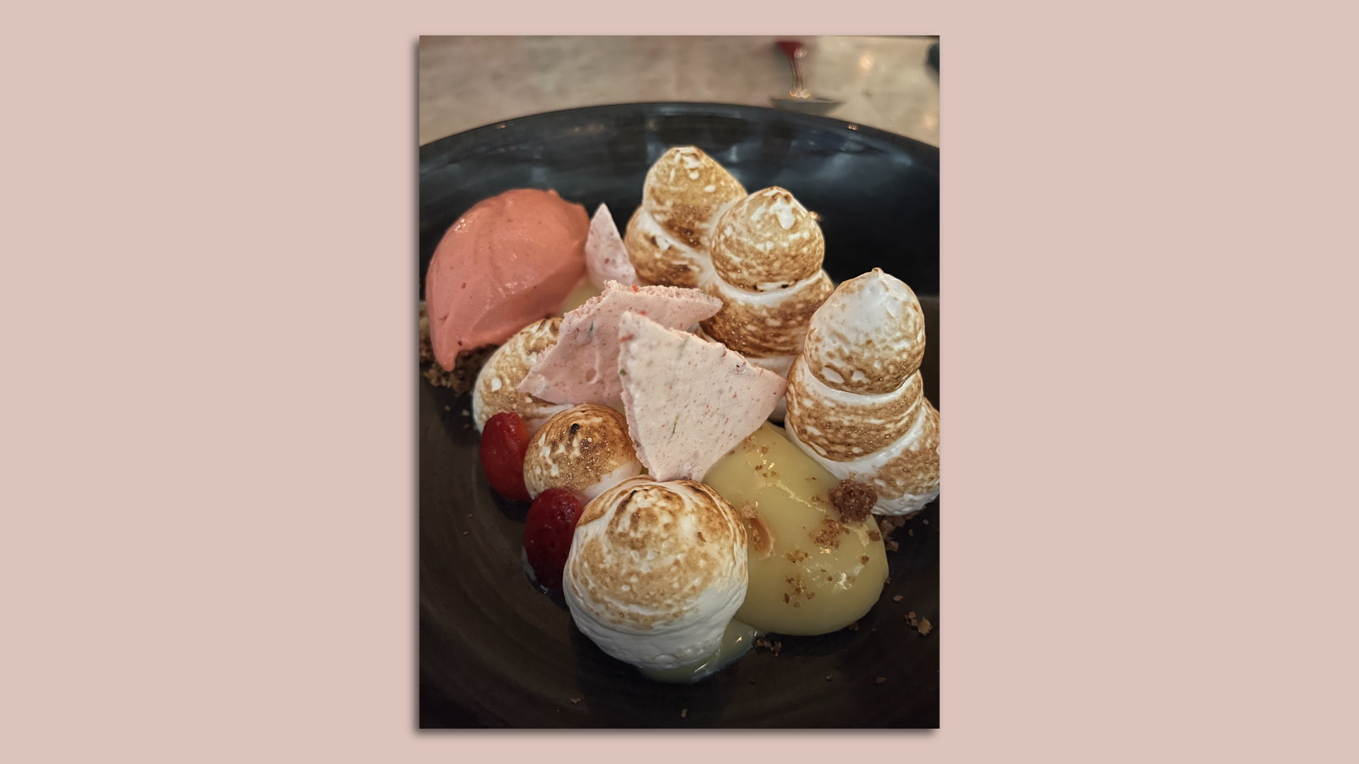 A deconstructed key lime pie from Red Rooster Overtown is pictured on a plate.