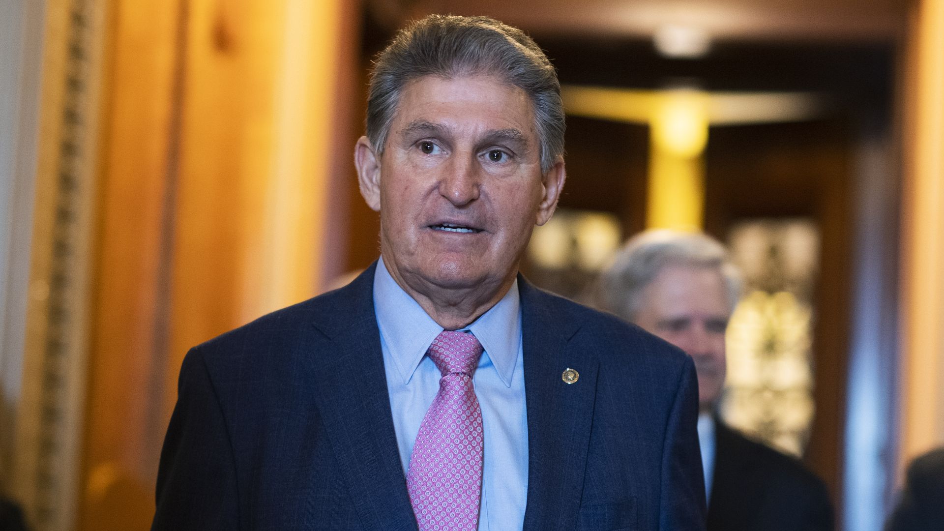 Photo of Joe Manchin in a suit