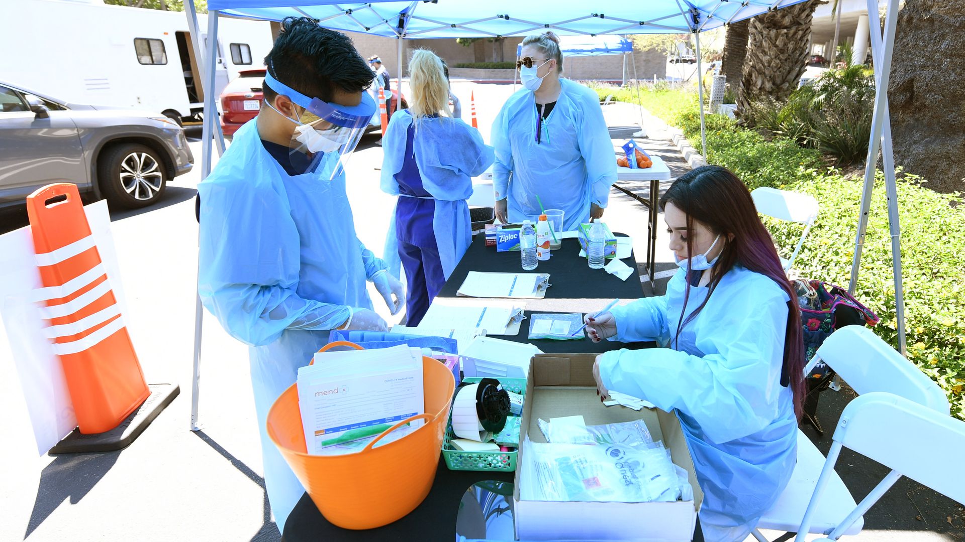 Medical workers processing on-site coronavirus tests.
