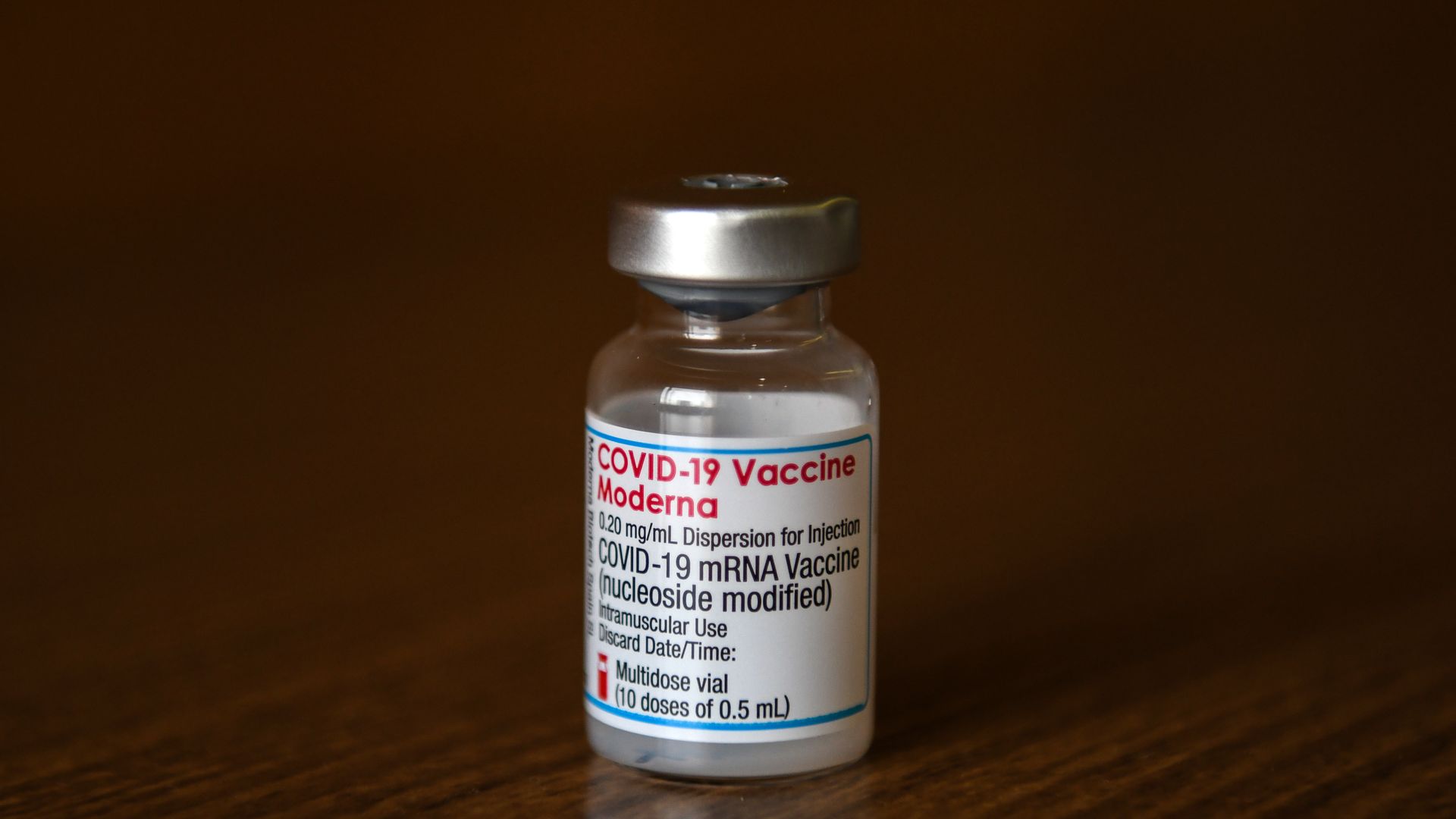 A bottle of the Moderna Inc. Covid-19 vaccine at a mass vaccination site in Saitama City, Saitama, Japan, on Monday, Aug. 23, 2021