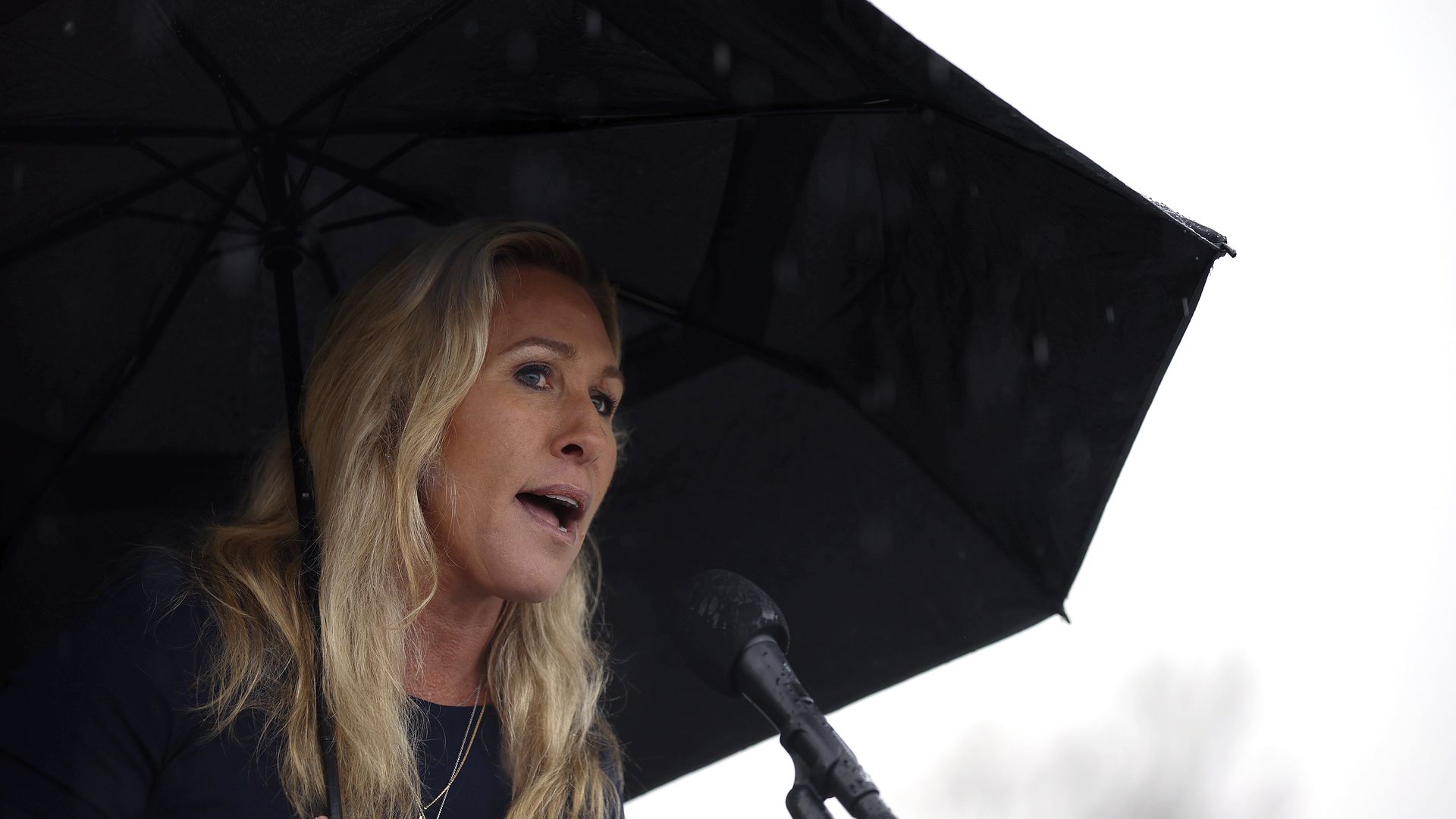 Rep. Marjorie Taylor Greene (R-GA) speaks a news conference in the rain outside of the U.S. Capitol on March 17, 2022 in Washington, DC.