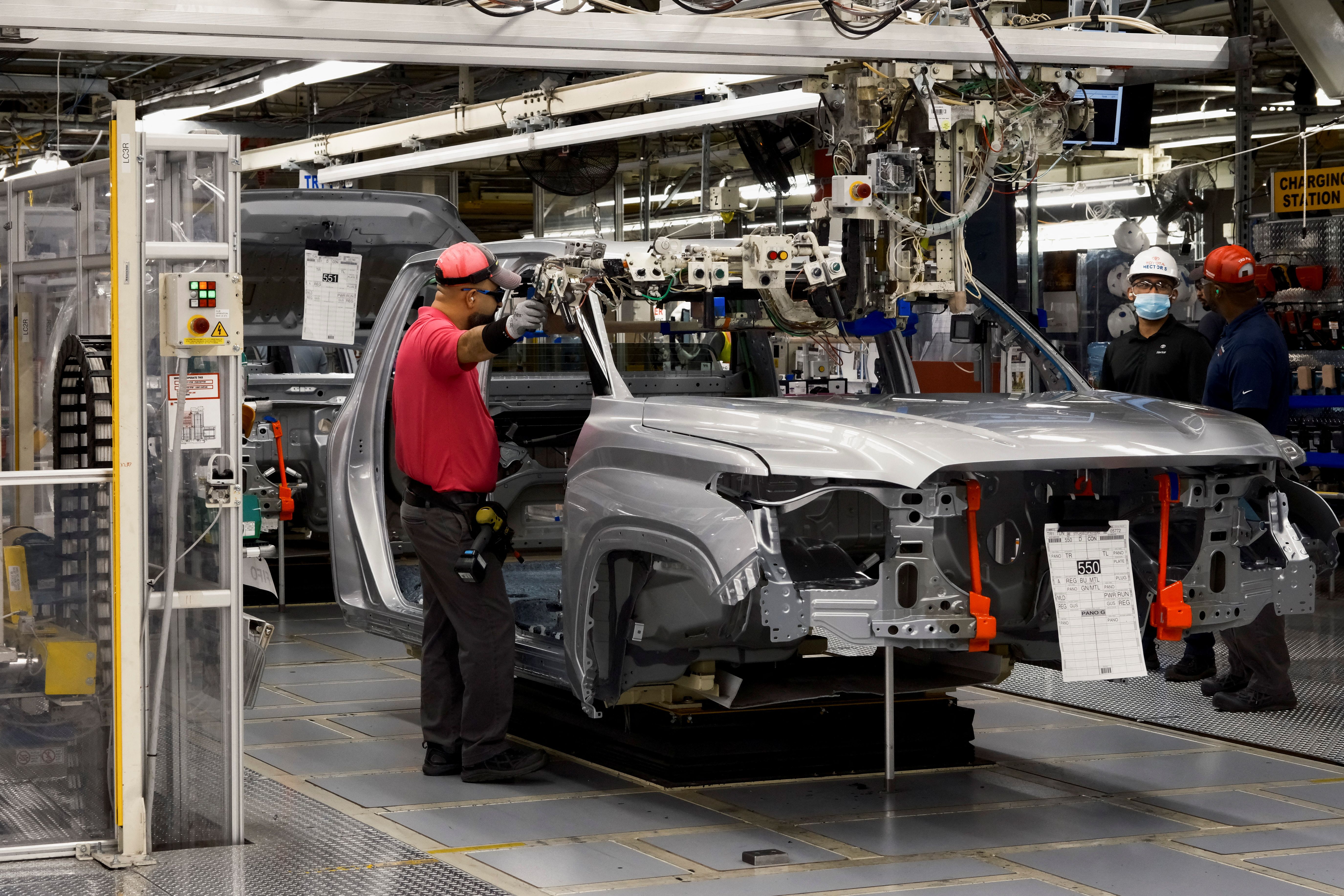 A worker assembles parts of a Toyota Tundra at the company's truck plant in San Antonio, Texas.
