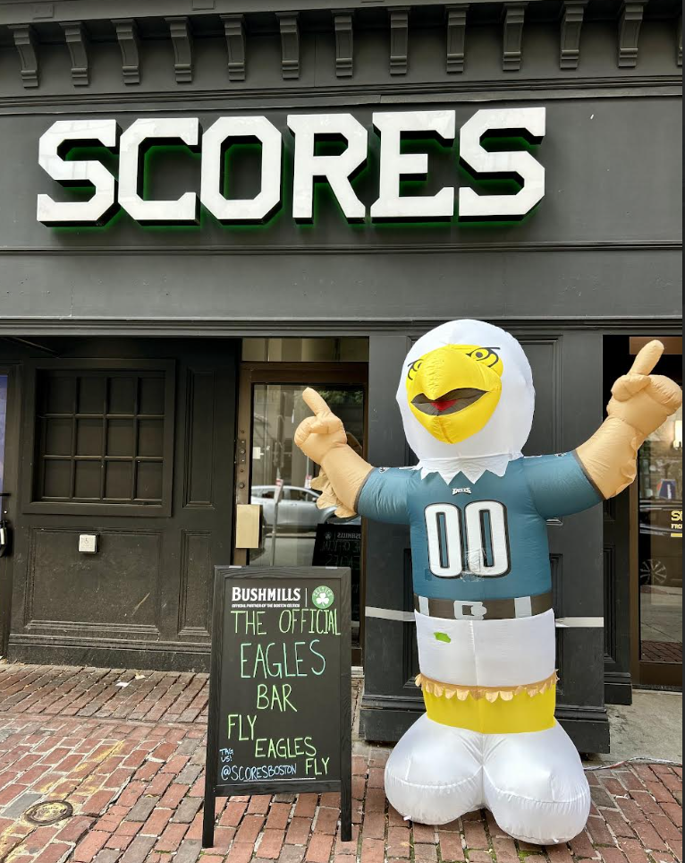 Swoop, the Eagles mascot, outside Scores Bar in Boston.