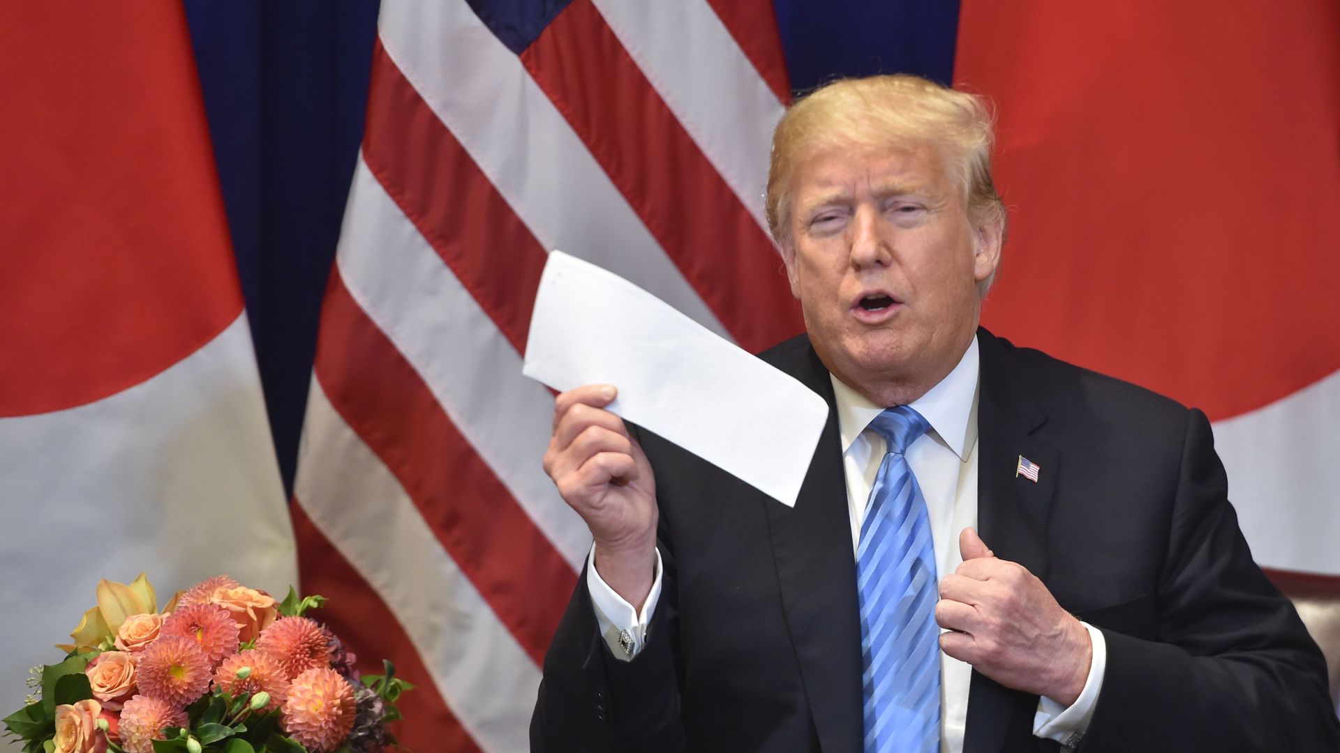 Trump holds Kim Jong Un letter
