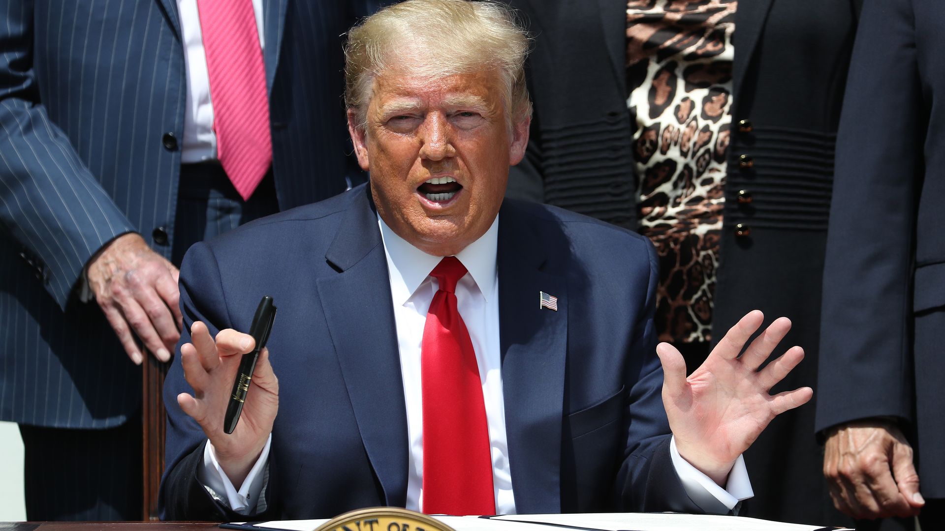 Donald trump sitting