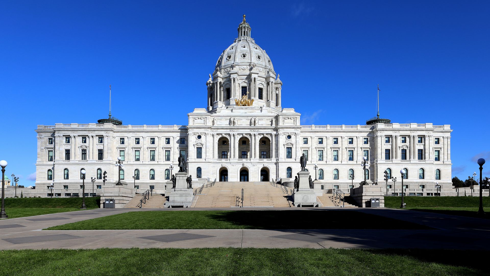 The Minnesota Capitol Building in front of a blue sky