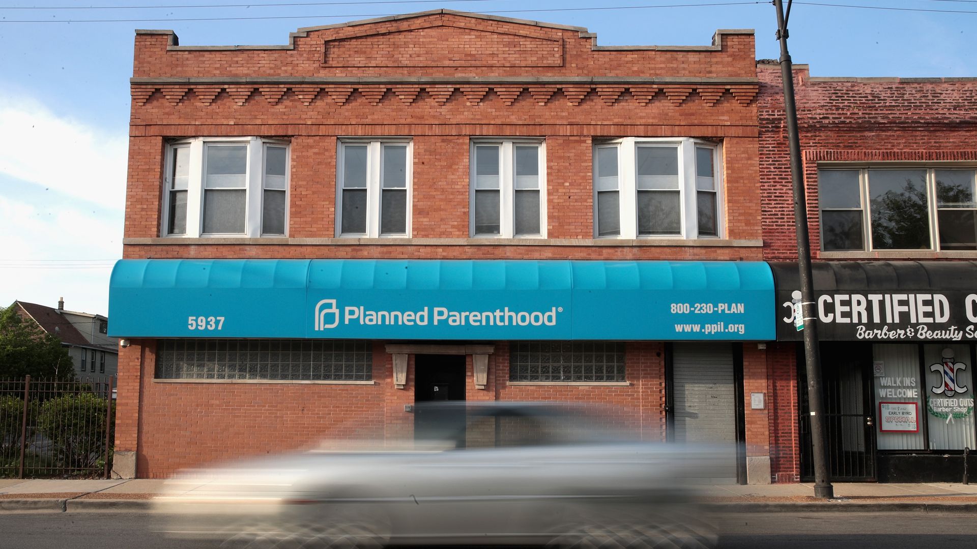 A car drives past a Planned Parenthood clinic in Chicago. 