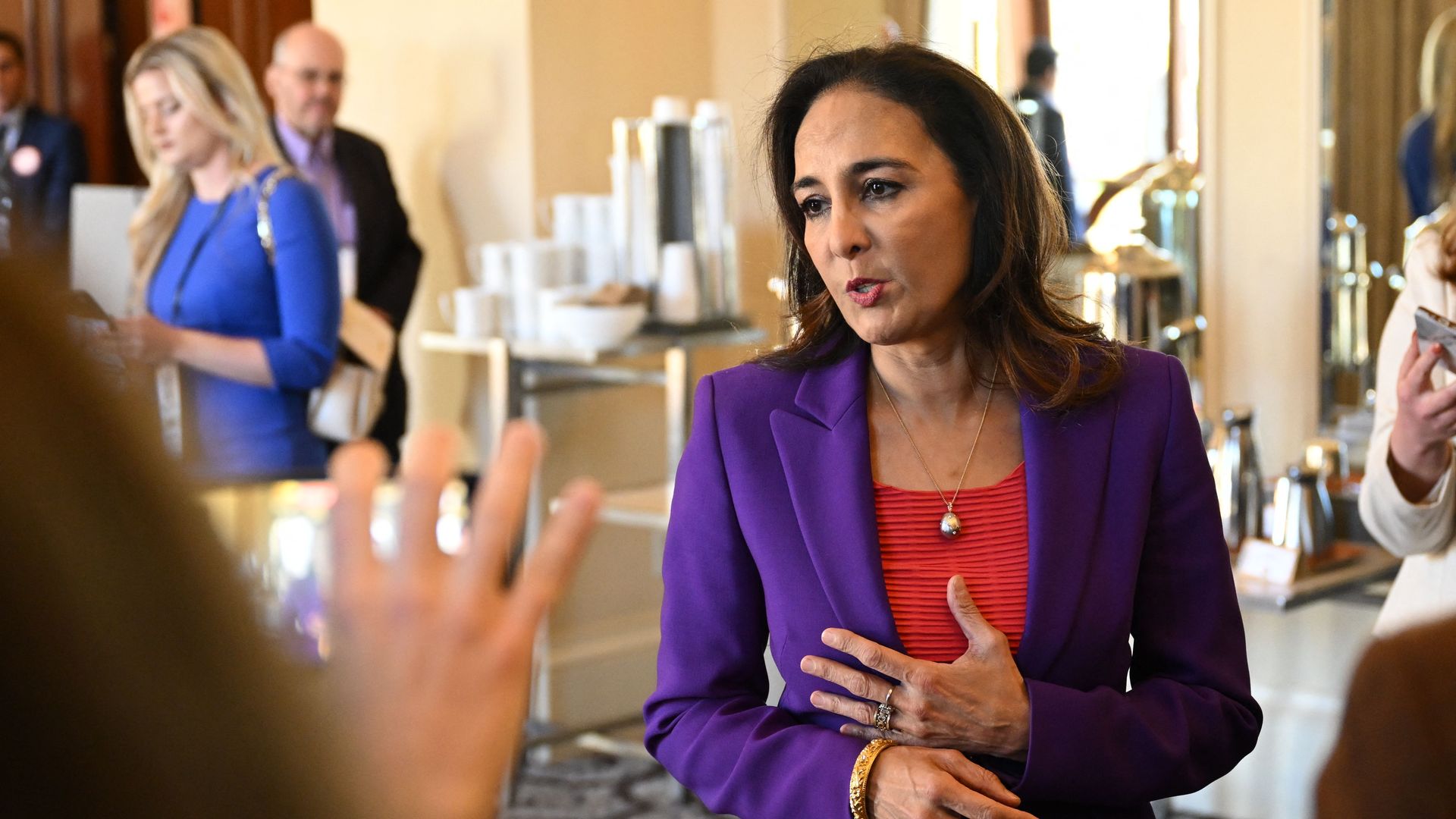 Harmeet Dhillon speaks to reporters. 