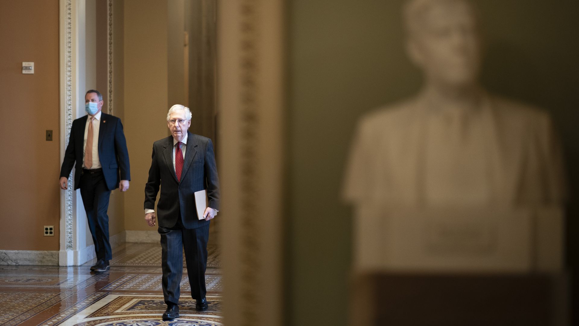 Senate Minority Leader Mitch McConnell is seen walking to the Senate Chamber on Thursday.