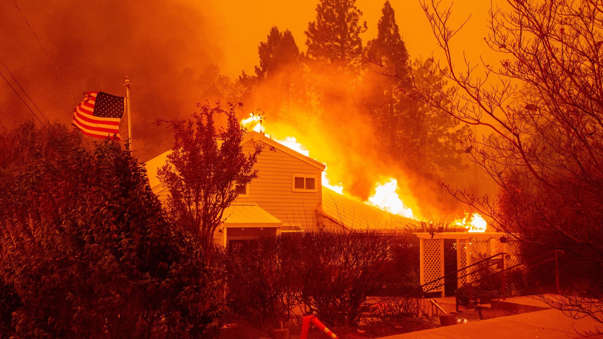 A house burns during the Camp fire in Paradise, California