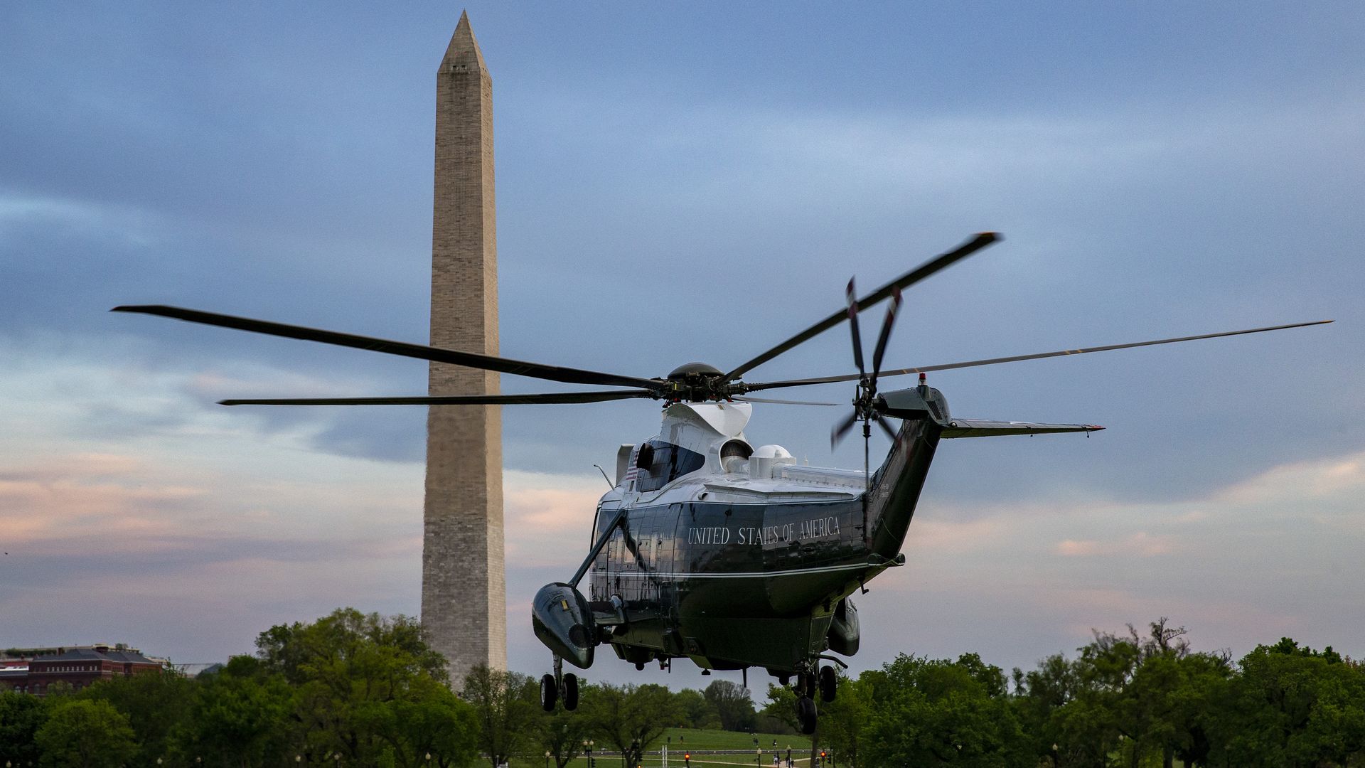 Marine One is seen taking off past the Washington Monument after dropping President Biden at the Ellipse on Sunday evening.