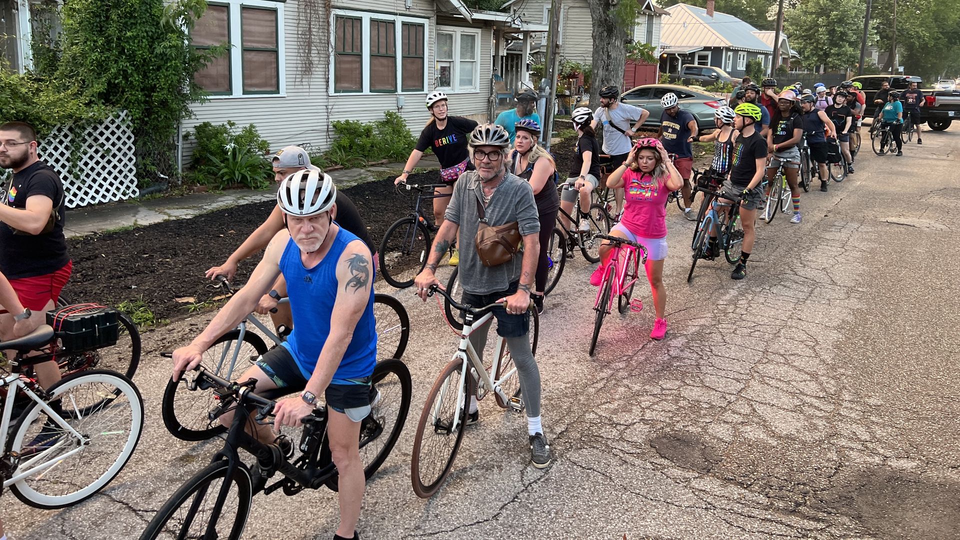 Dozens of cyclists line up for the weekly Houston Pride Ride 