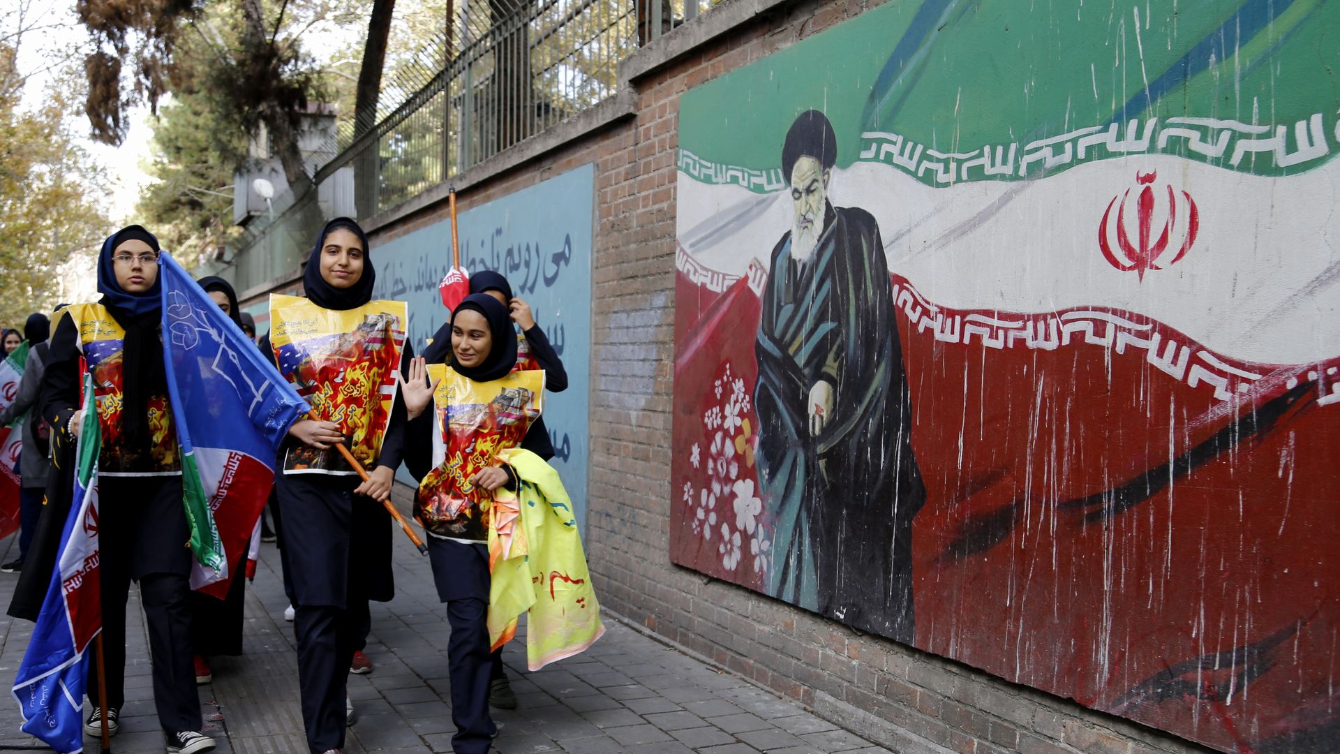 Iranians attend a rally in Terhan.