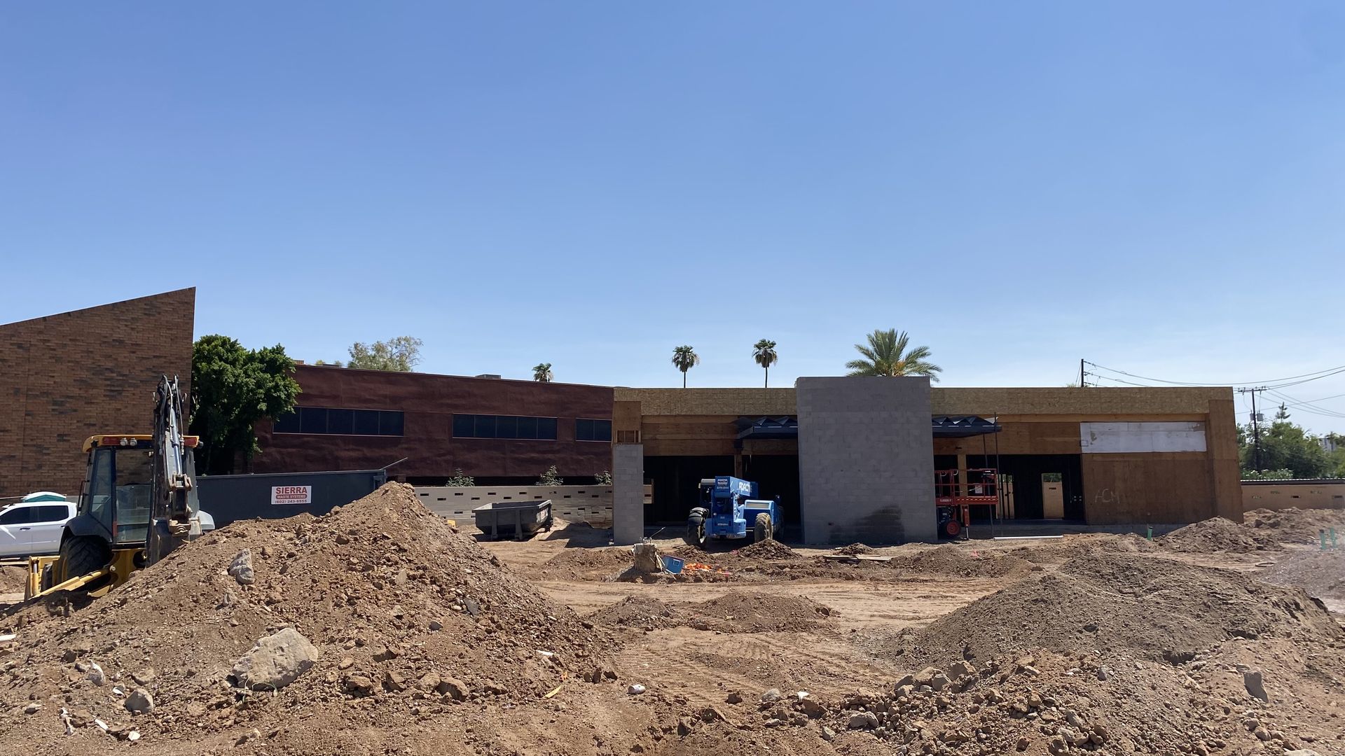 A construction site for a partially completed fast food restaurant. 