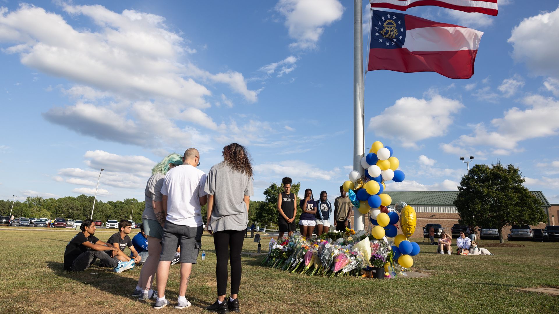 Students and community members gather at a makeshift memorial outside of Apalachee High School on September 5, 2024 in Winder, Georgia. 