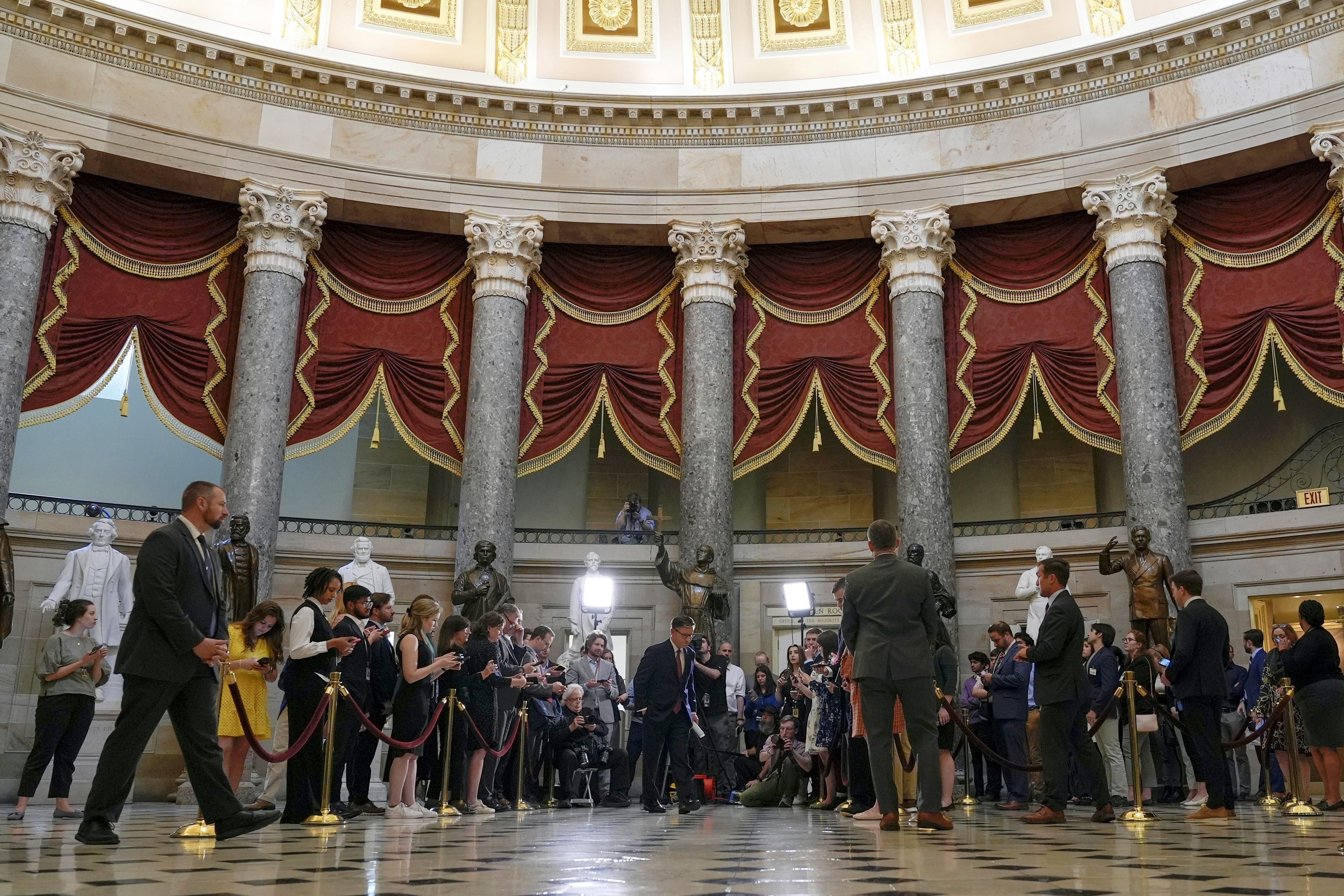 Speaker Mike Johnson leaves a press conference on foreign aid bills for Ukraine, Israel and Taiwan yesterday.