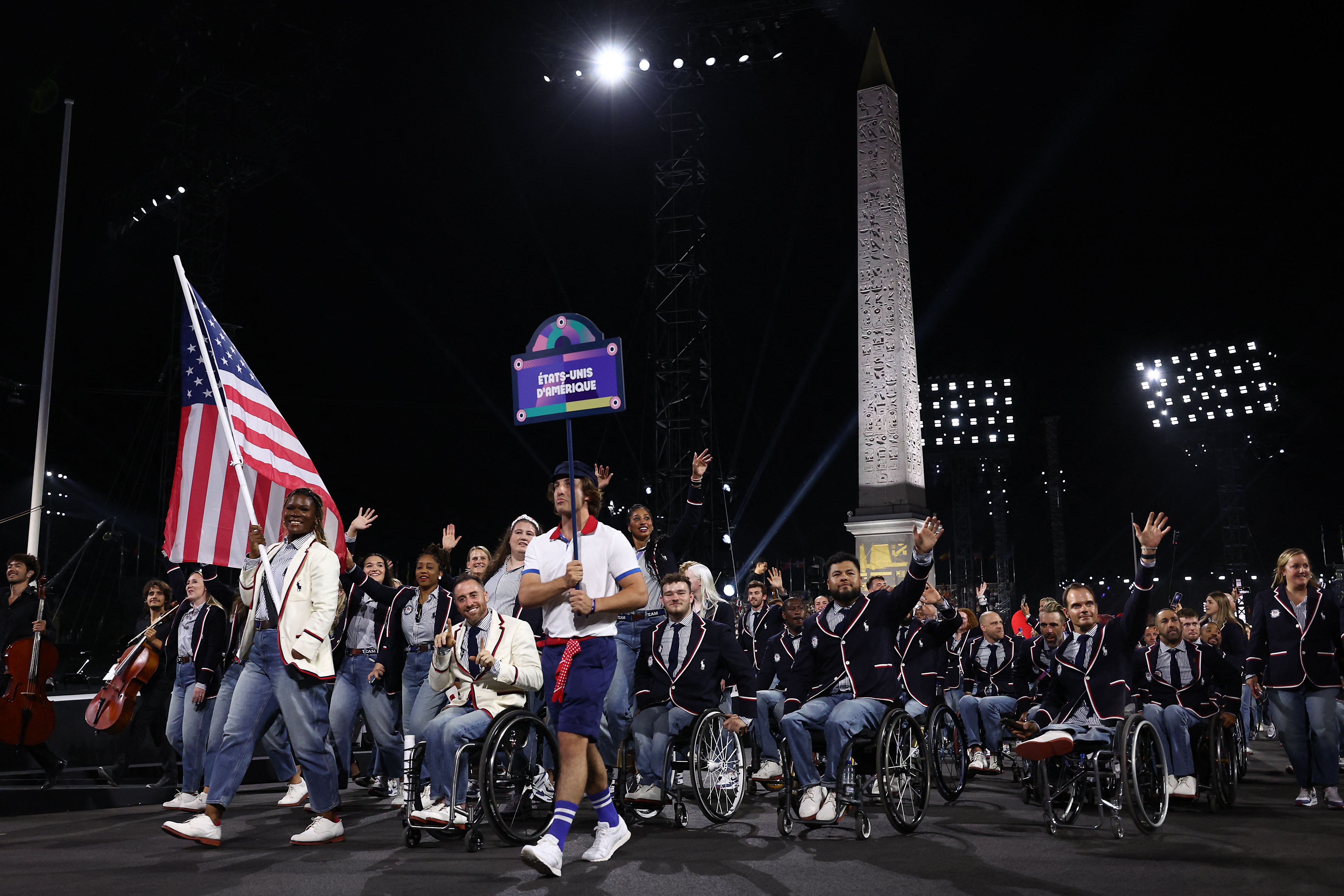 The U.S. delegation parades at the Place de la Concorde with the Obelisque de Louxor (Luxor Obelisk) in the background during the Paris 2024 Paralympic Games Opening Ceremony in Paris on Aug. 28.