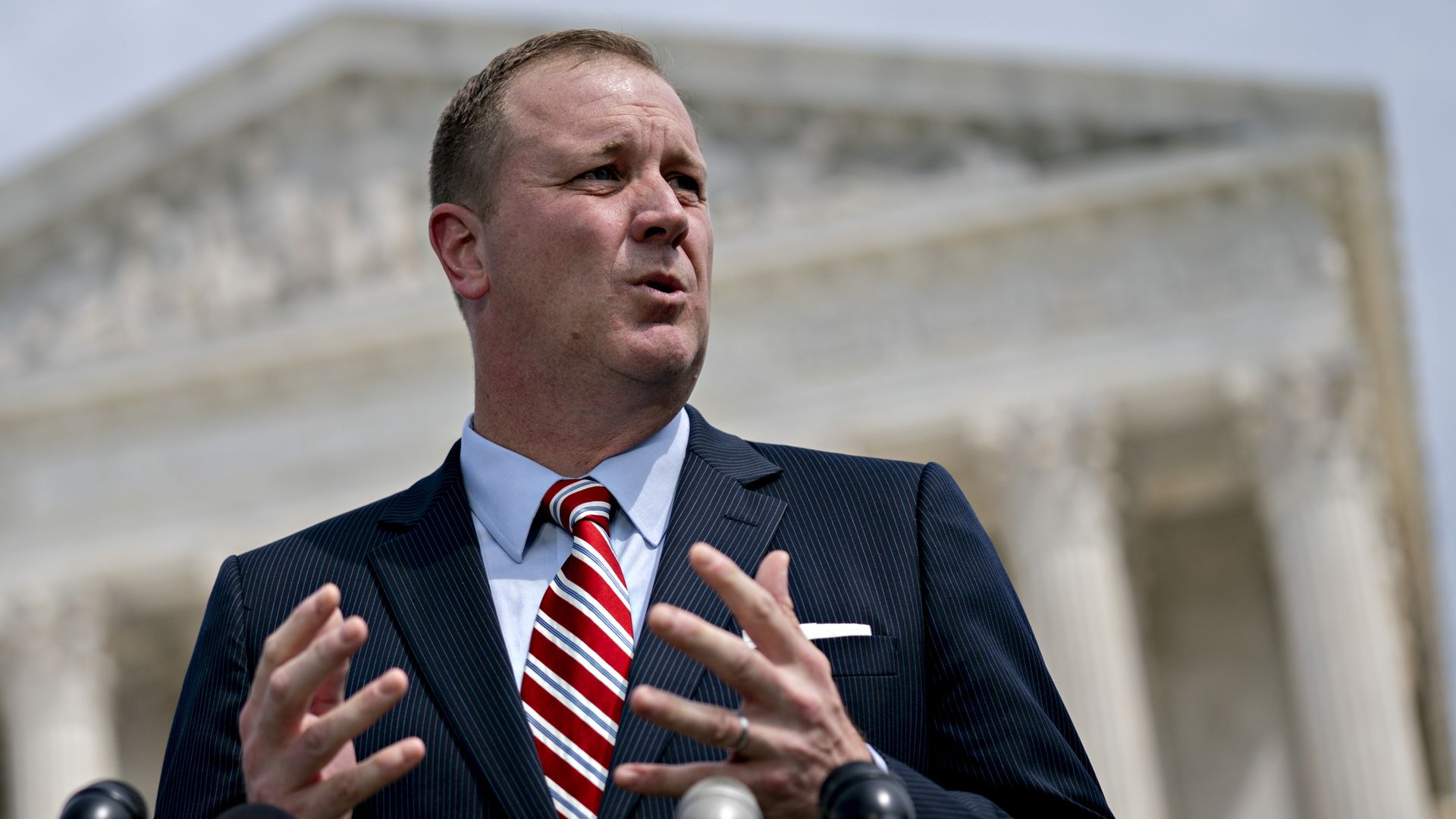 Eric Schmitt, Missouri attorney general, speaks during a news conference outside the Supreme Court in Washington, D.C., U.S., on Monday, Sept. 9, 2019.