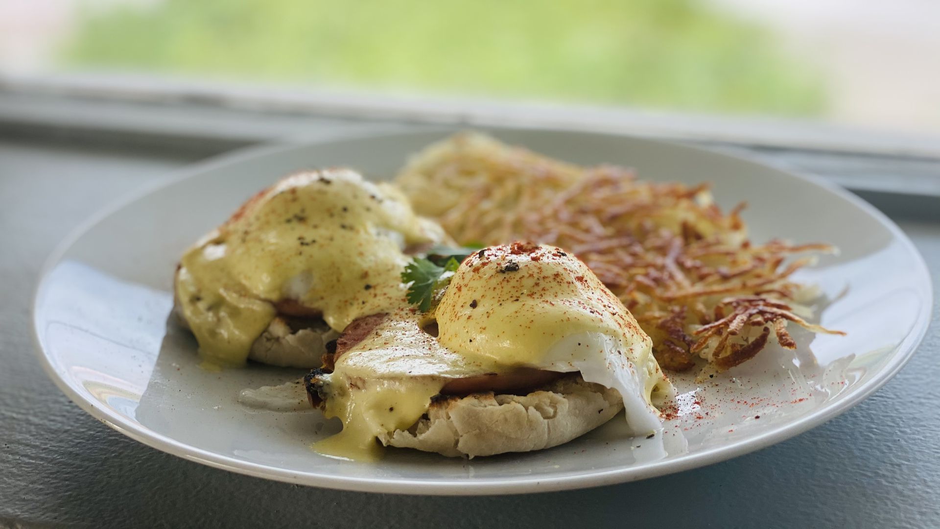 A photo of eggs Benedict with latkes.