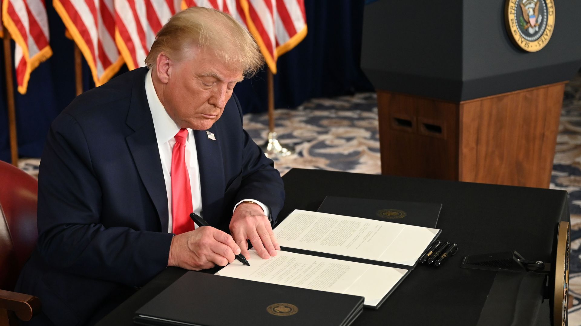 Trump signing executive orders Aug. 8
