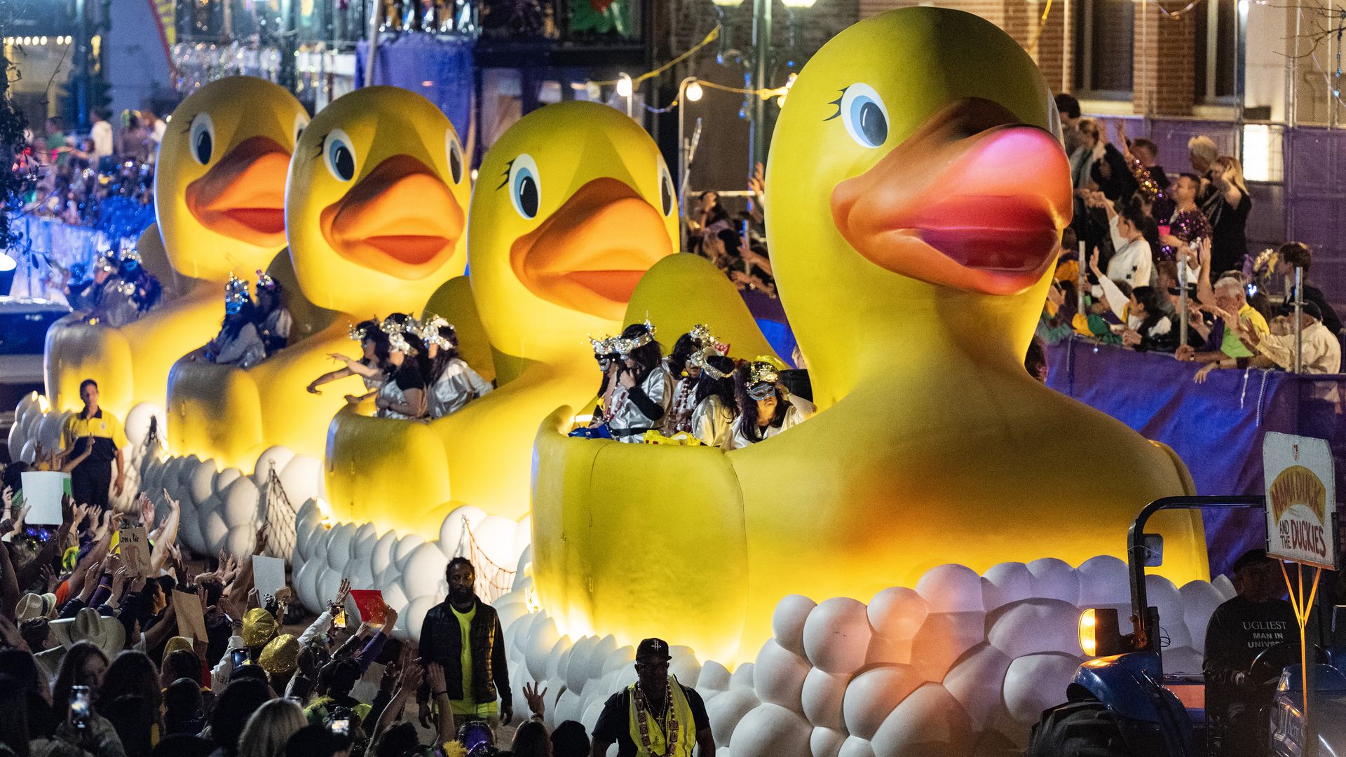 Image shows duck floats during the Muses parade in New Orleans.