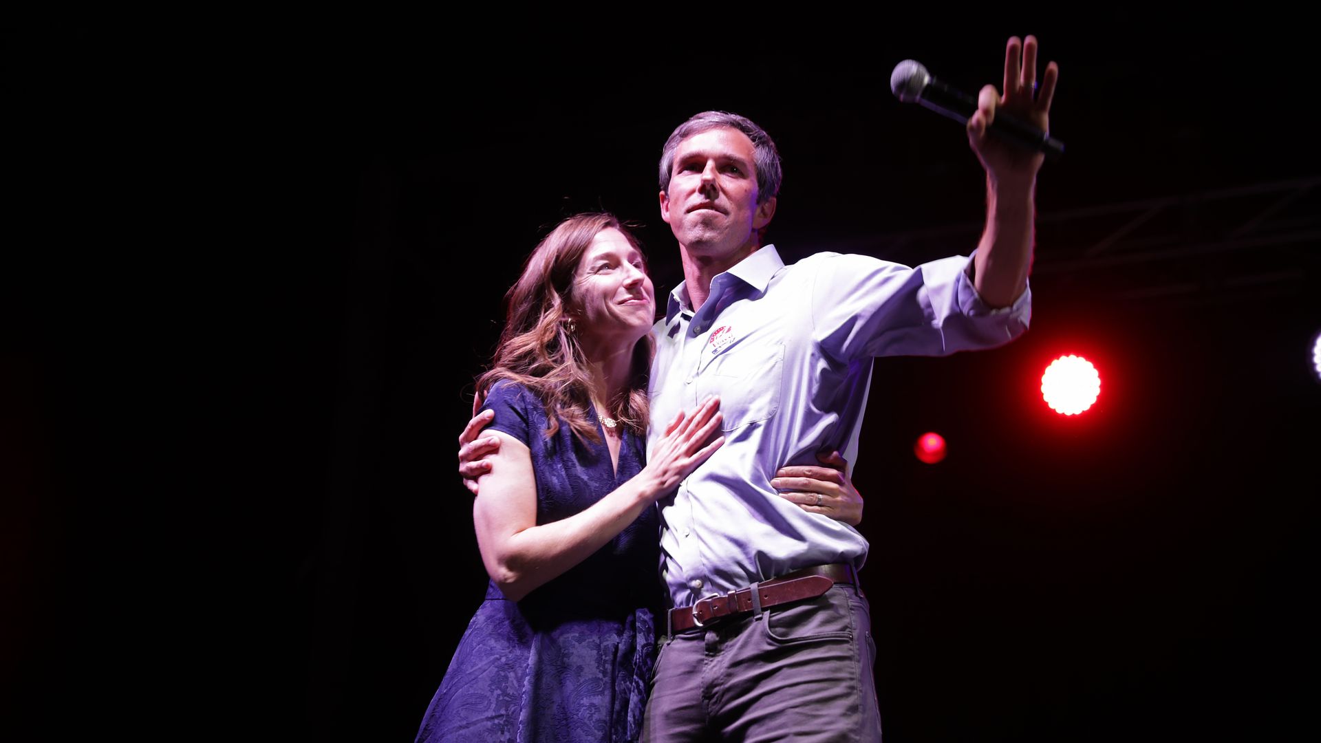 Beto O'Rourke and wife Amy Sanders arrive onstage at Southwest University Park November 06, 2018 in El Paso, Texas.