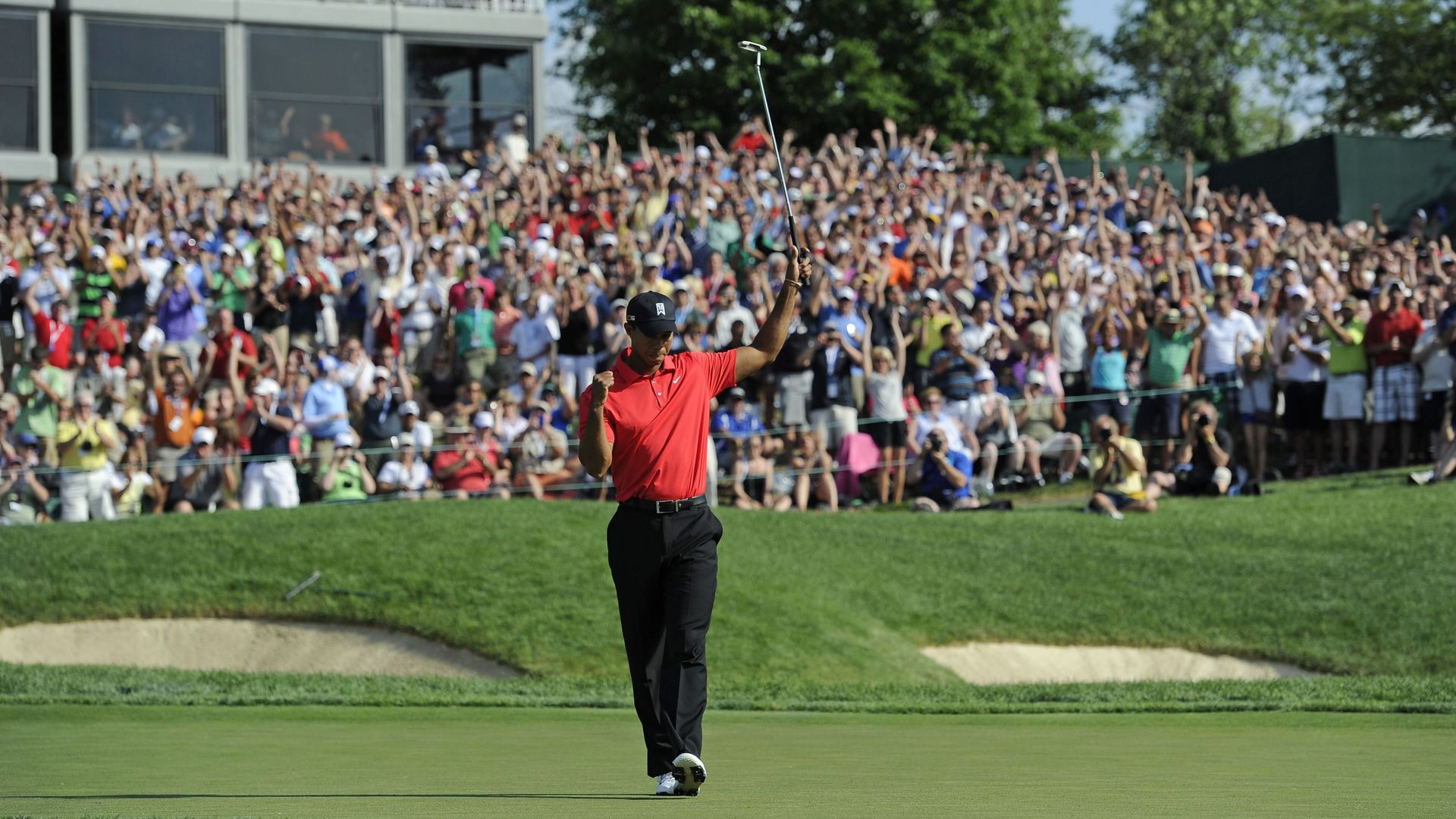 Tiger Woods celebrating