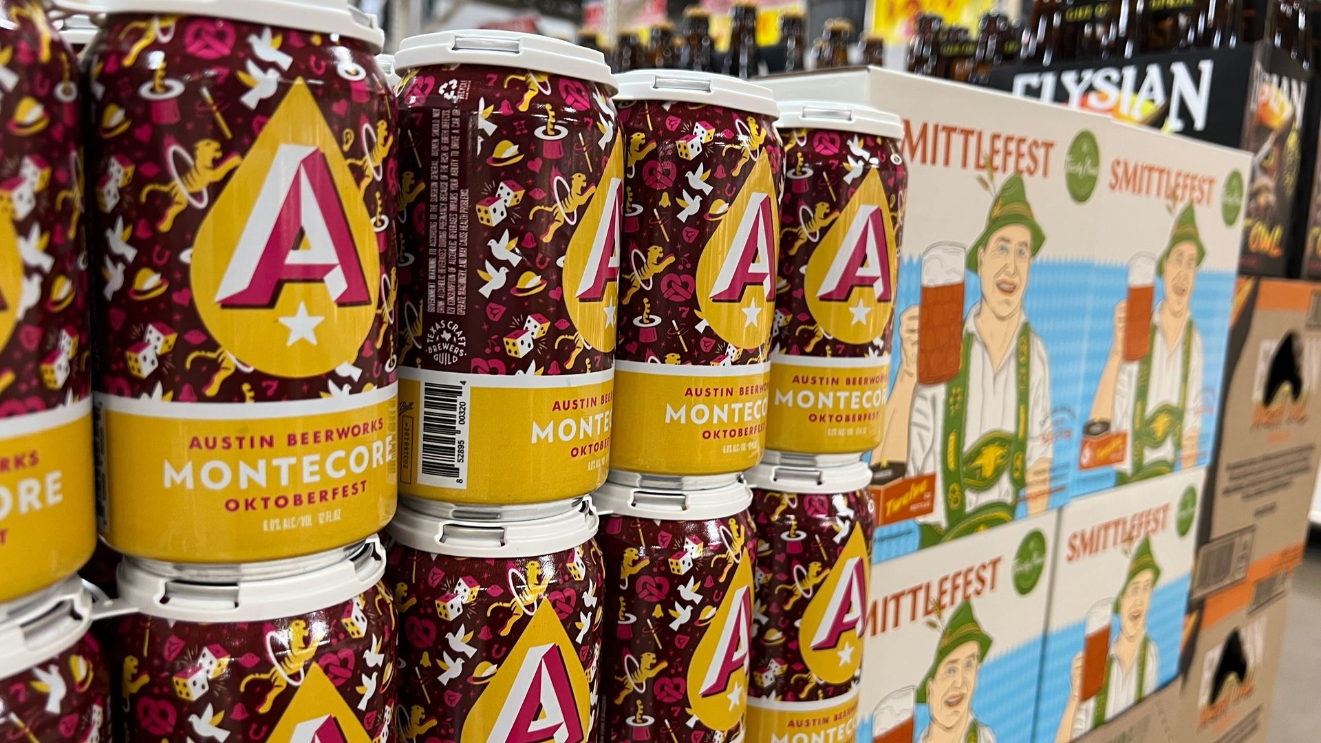 cans of beer stacked in a store display