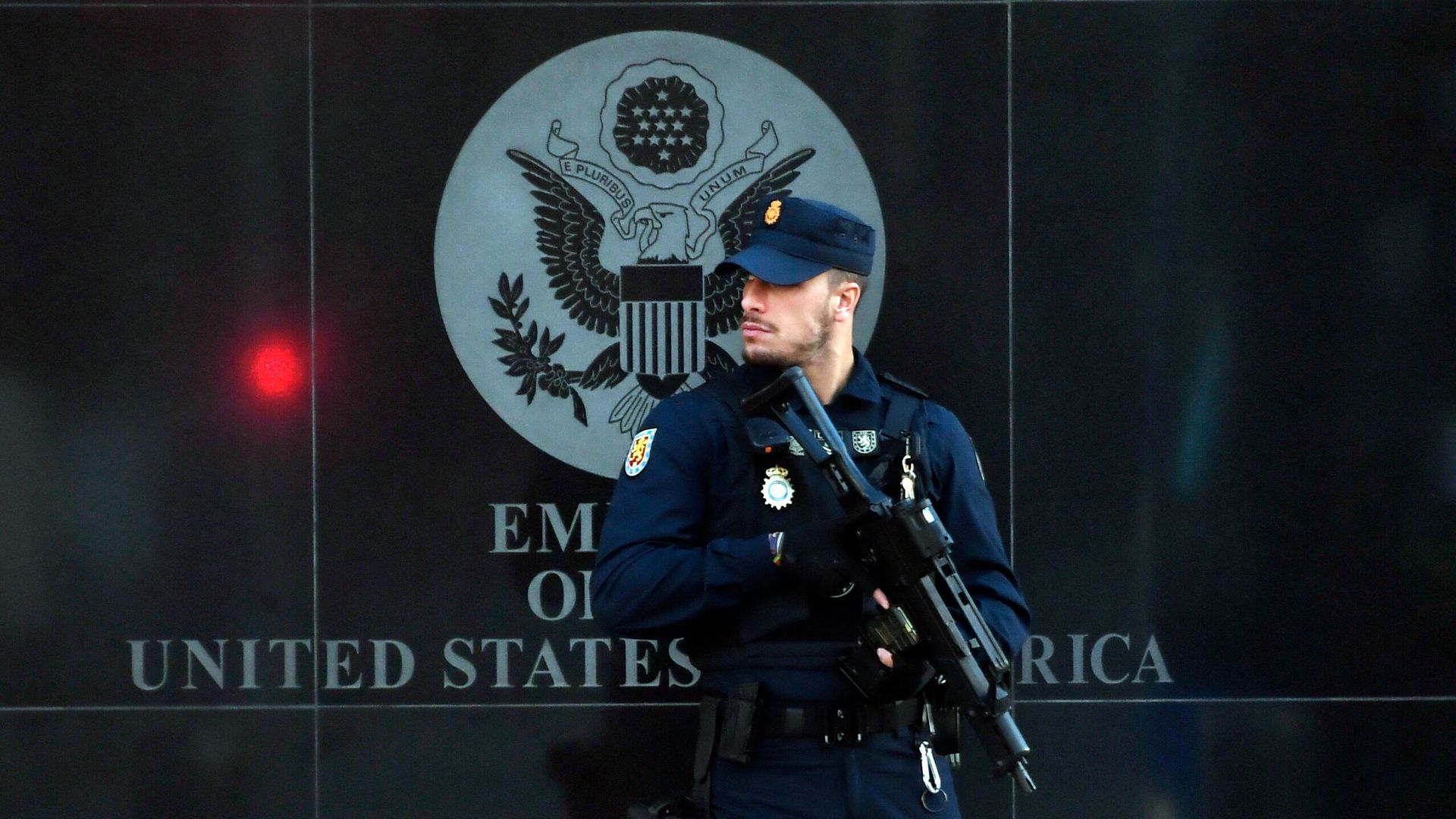 A Spanish policeman stands guard near the US embassy in Madrid.