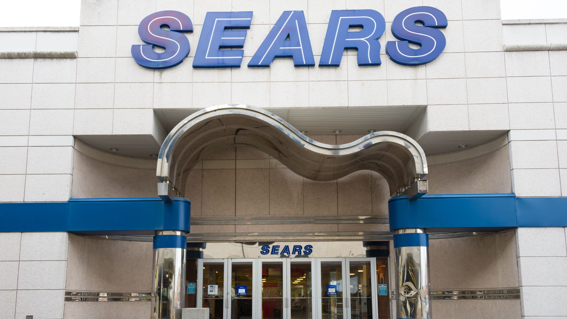 The exterior of a Sears department store.