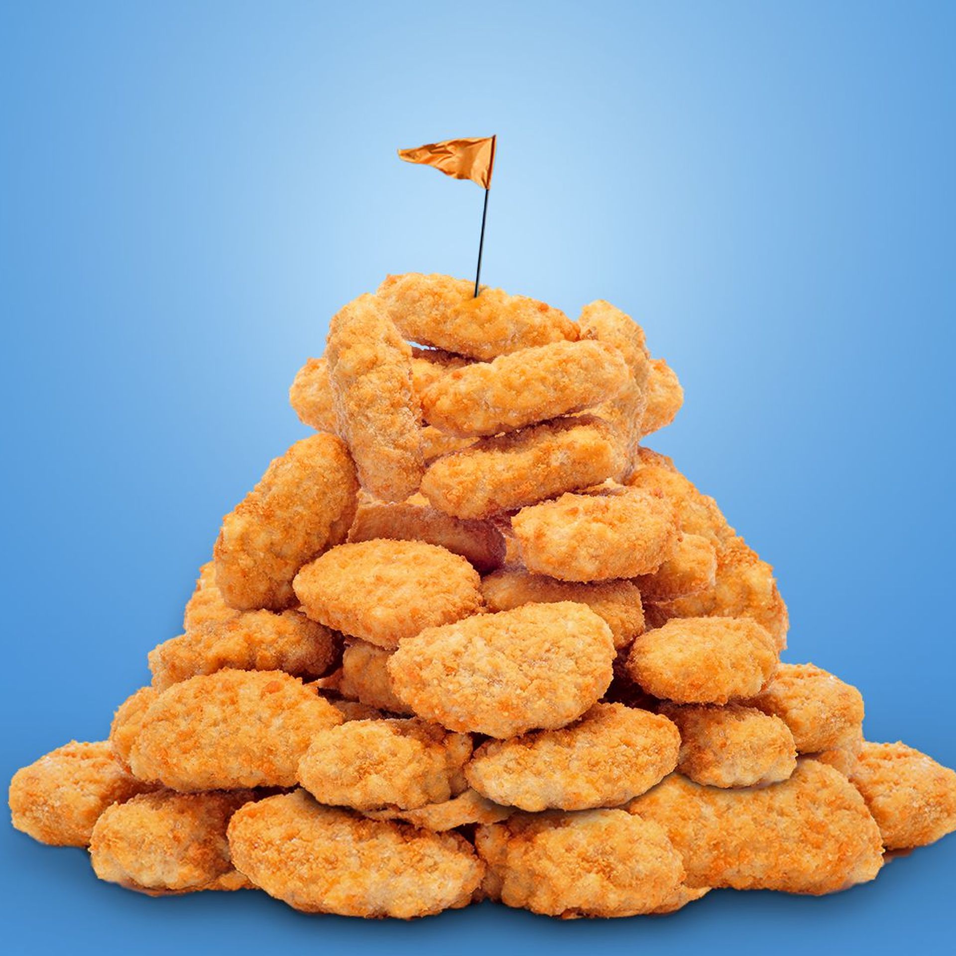Illustration of a mountain of chicken nuggets with a flag planted at the top