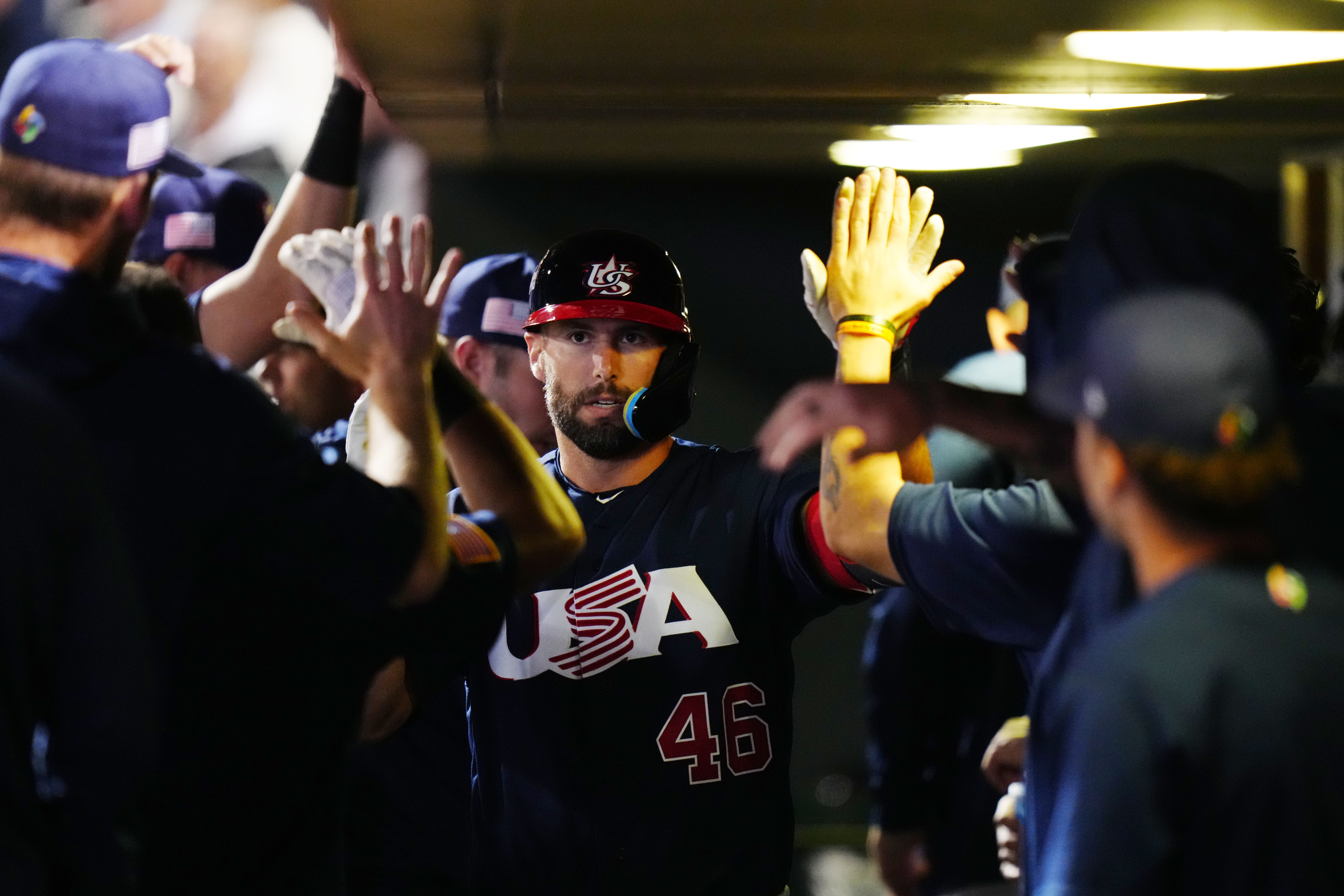 paul goldschmidt high fives teammates