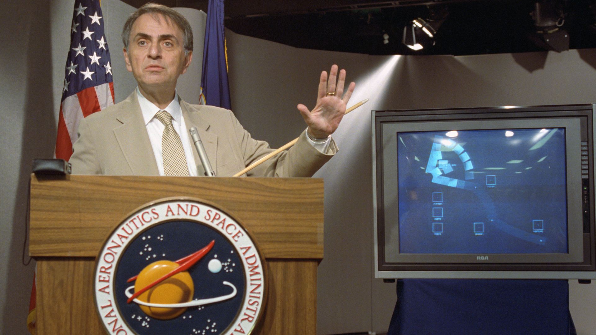 Photo of Carl Sagan at a podium